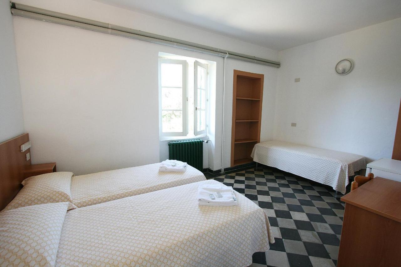 Camera Matrimoniale/Doppia con Letti Singoli con Letto Supplementare
