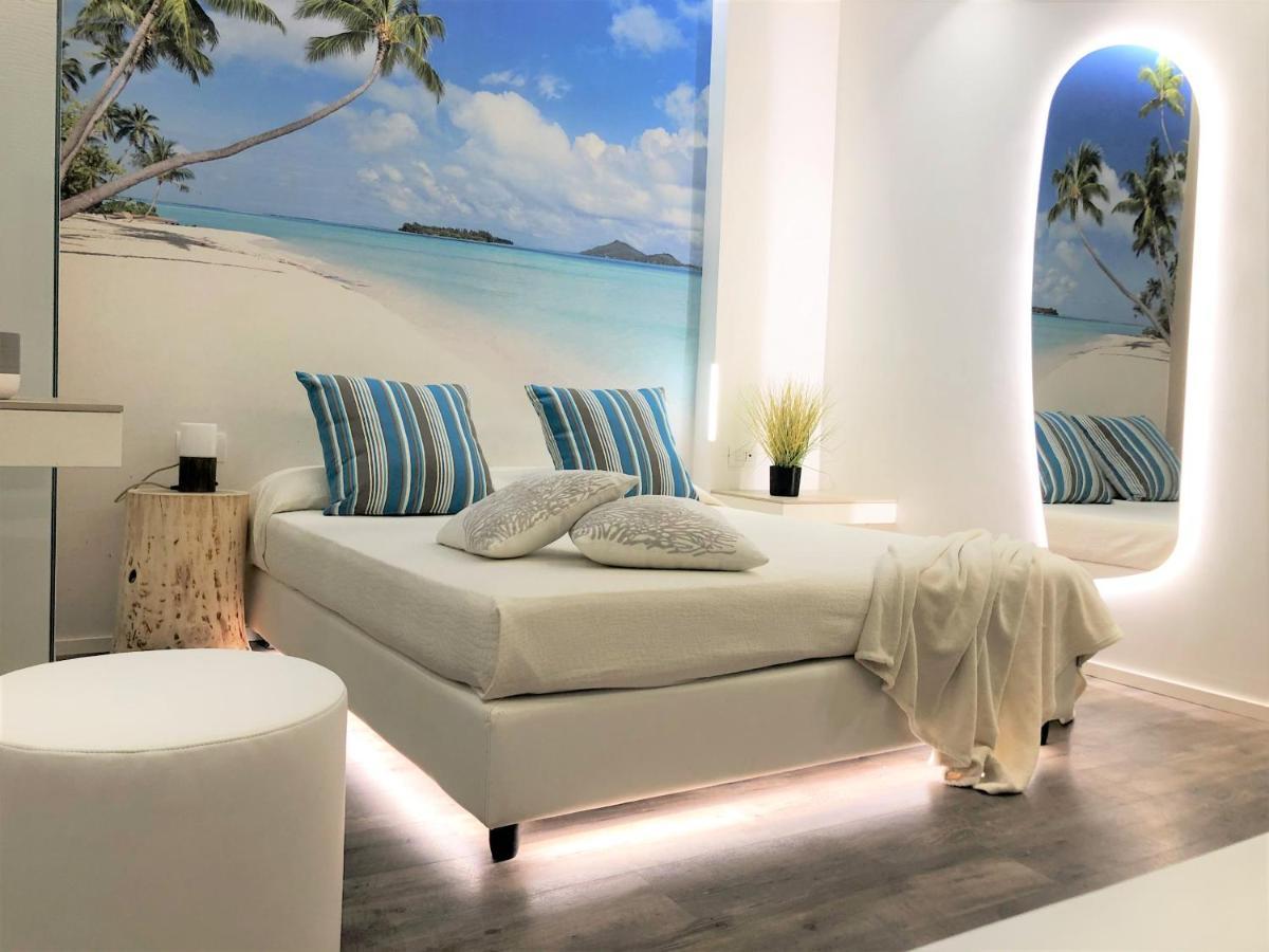 Deluxe Triple Room Partial Sea View Beach Access