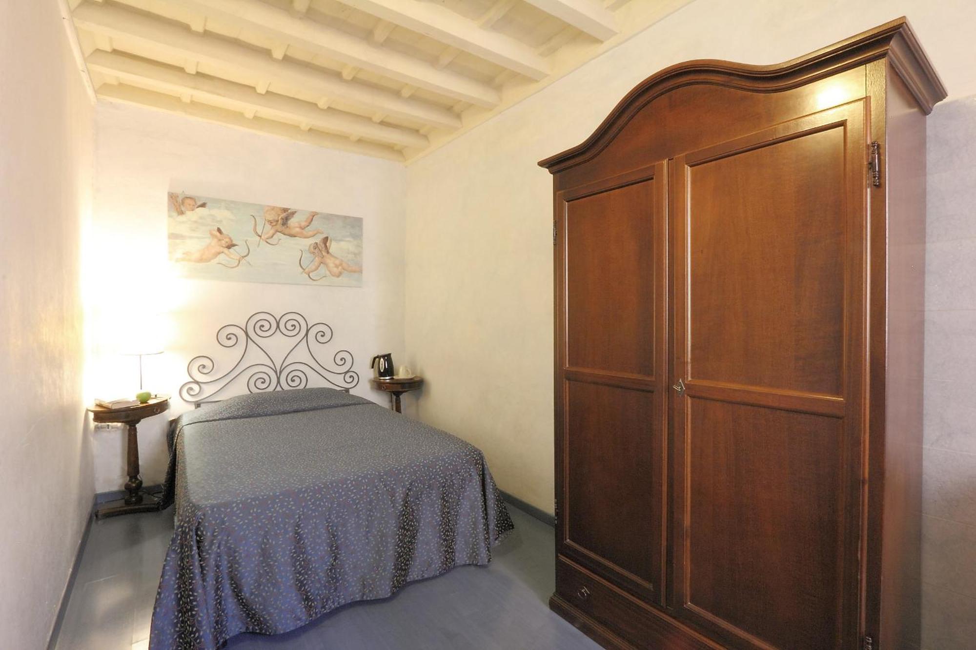 Camera Singola con Bagno in Comune