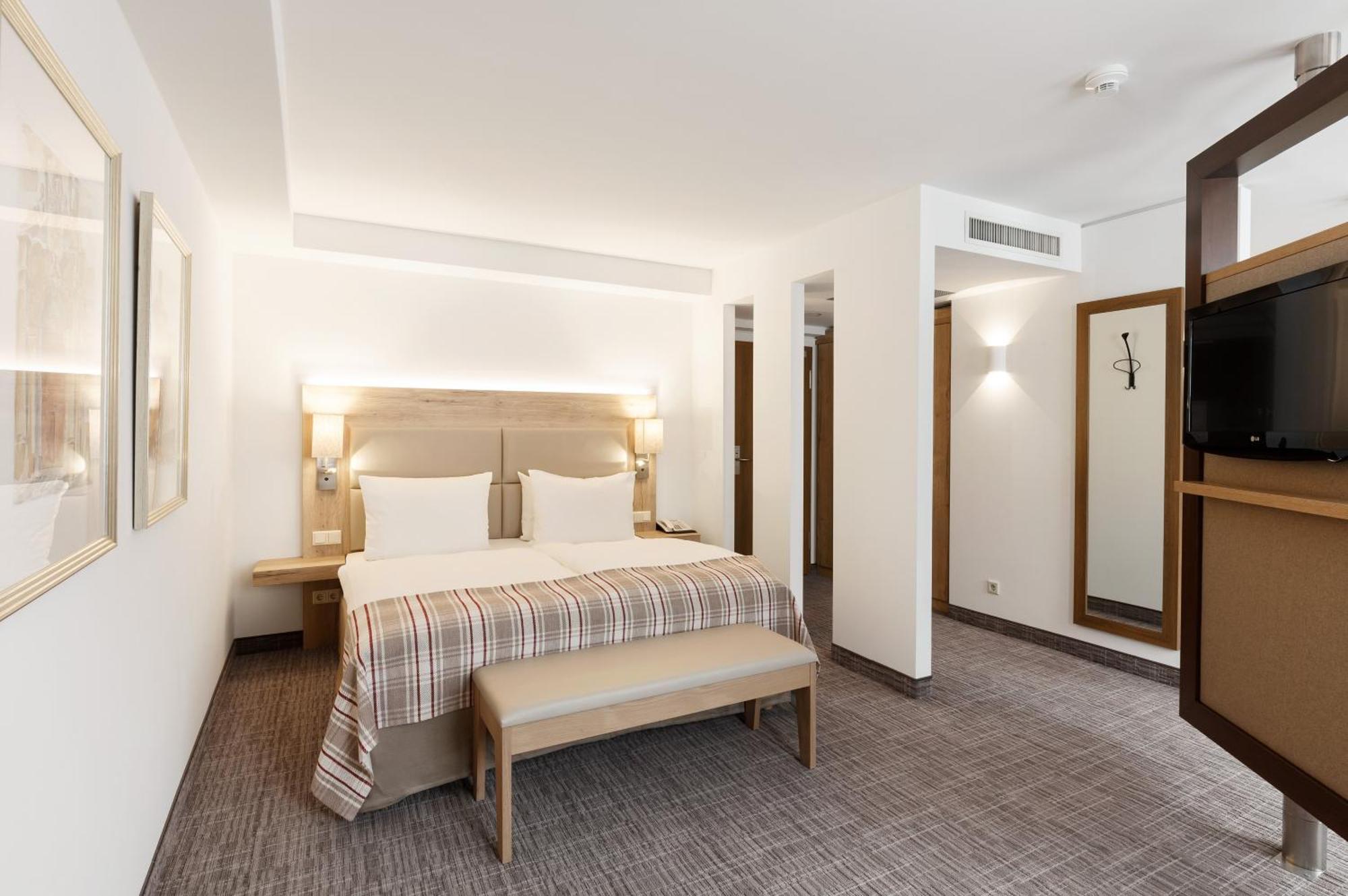 Camera Premium con 1 Letto King-Size e 1 Letto a Castello