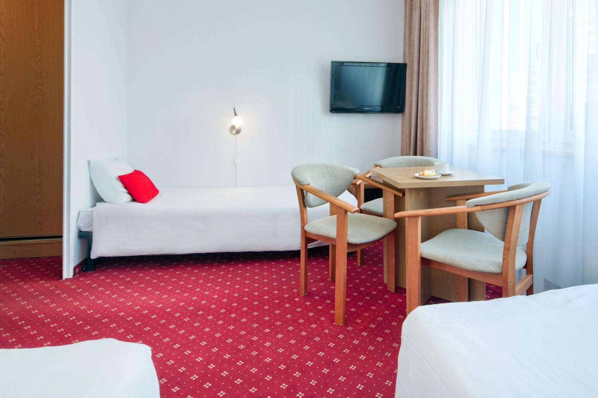 Standard Plus Triple Room