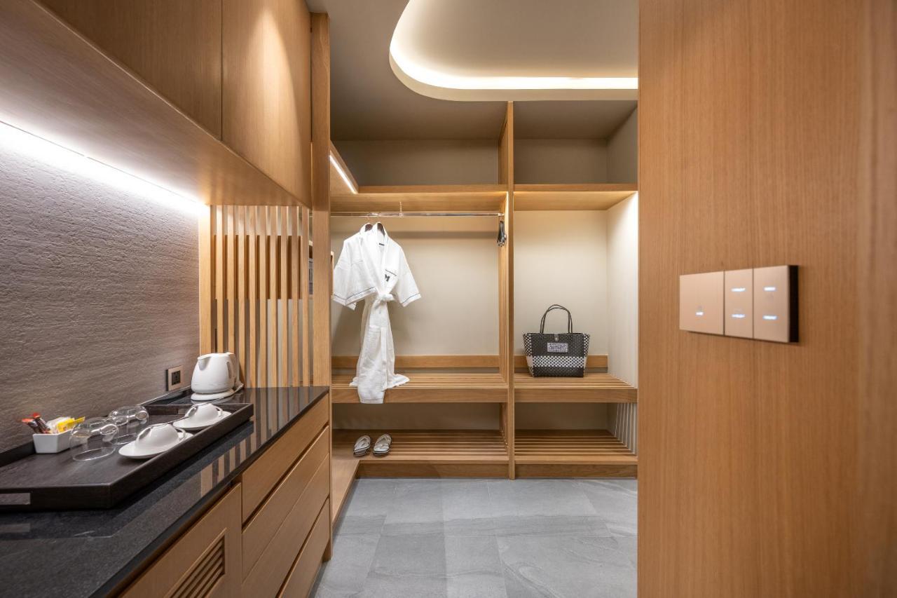 Junior Suite Doppia con Letti Singoli con Accesso Piscina - Piano Terra
