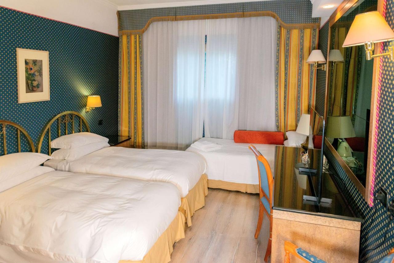 Classic Triple Room Three Single Beds