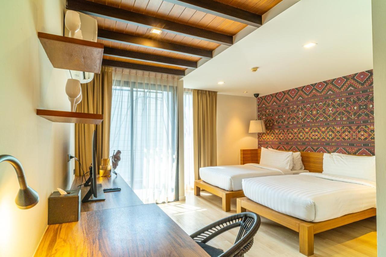 Camera Doppia con Letti Singoli ad Angolo
