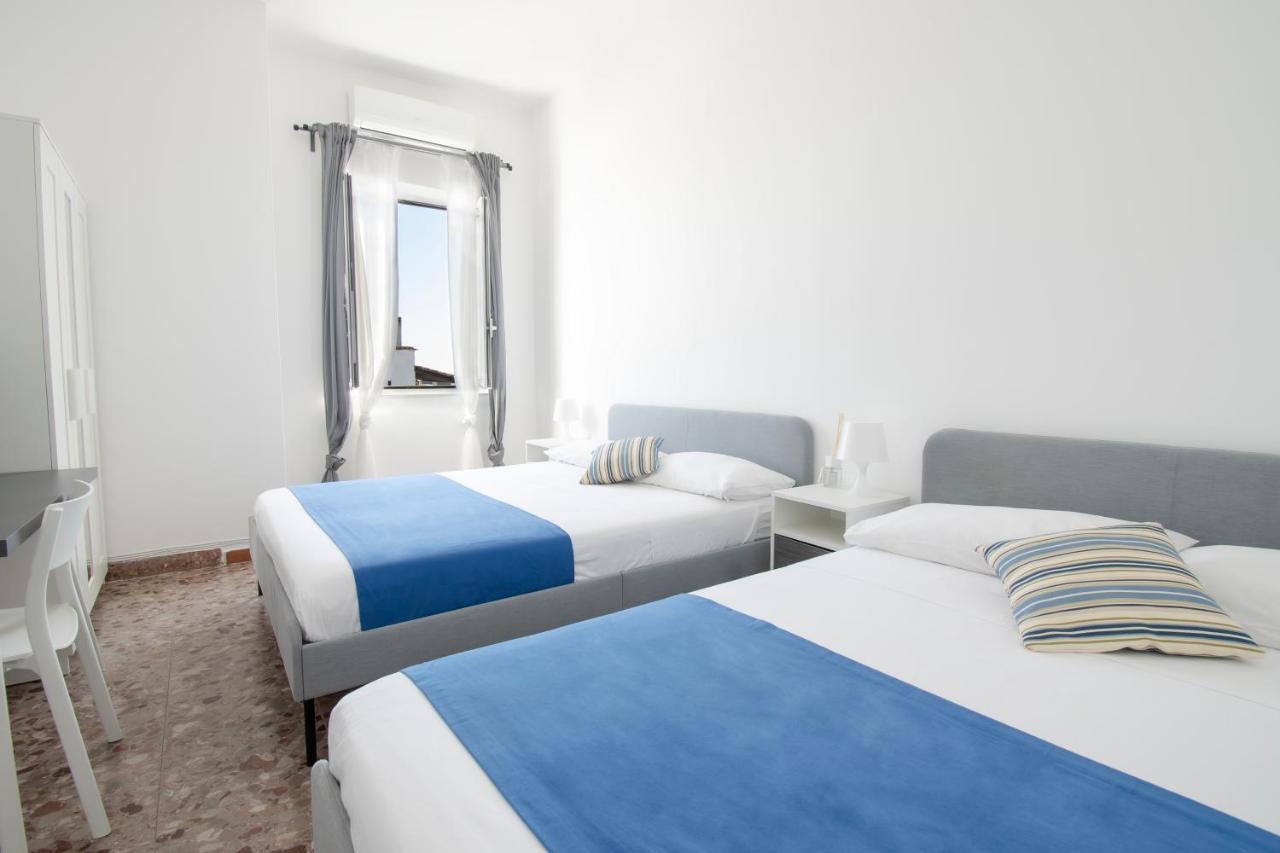 Camera Familiare con Bagno in Comune