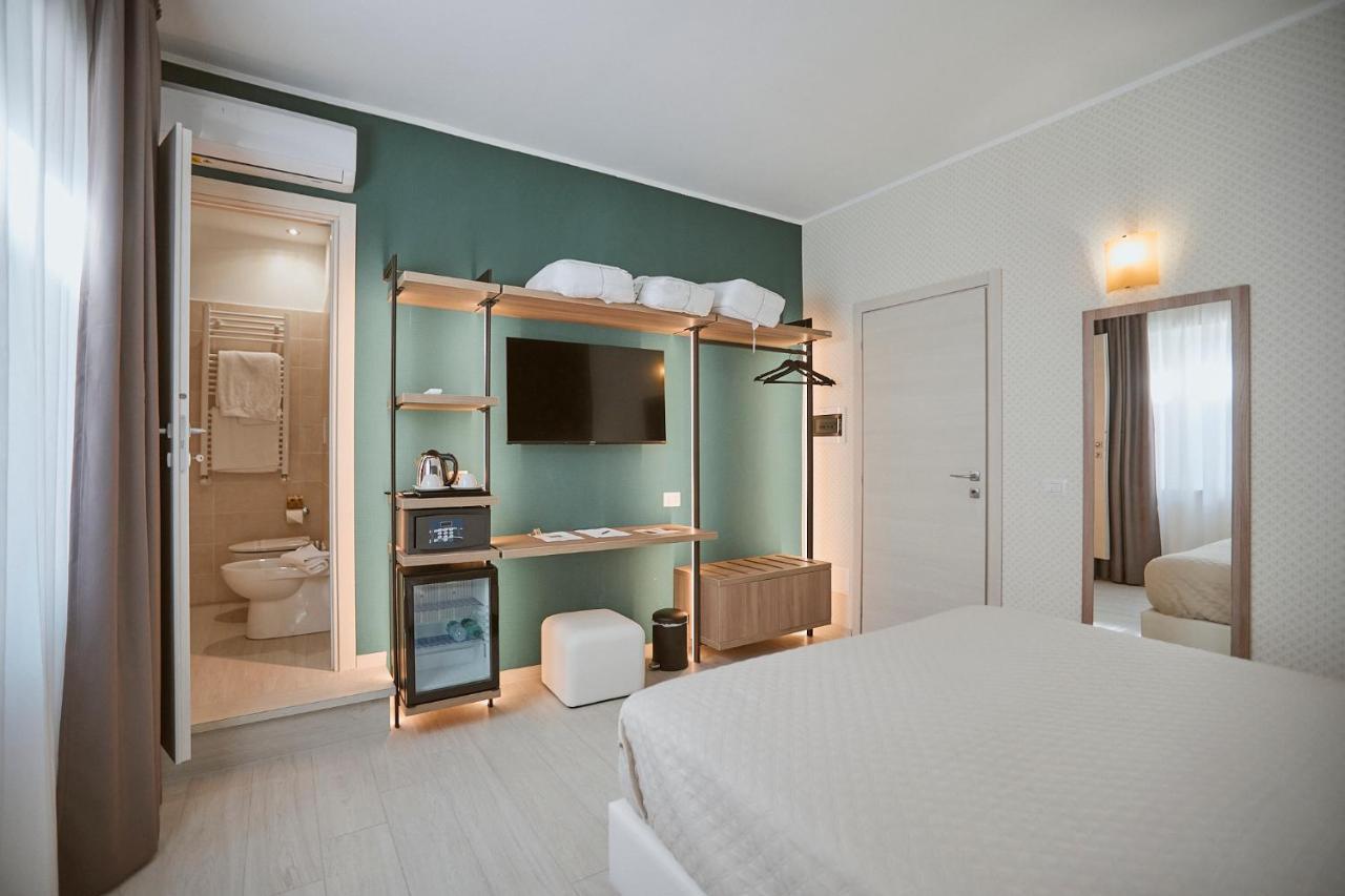 Camera Matrimoniale/Doppia con Letti Singoli con Letto Supplementare