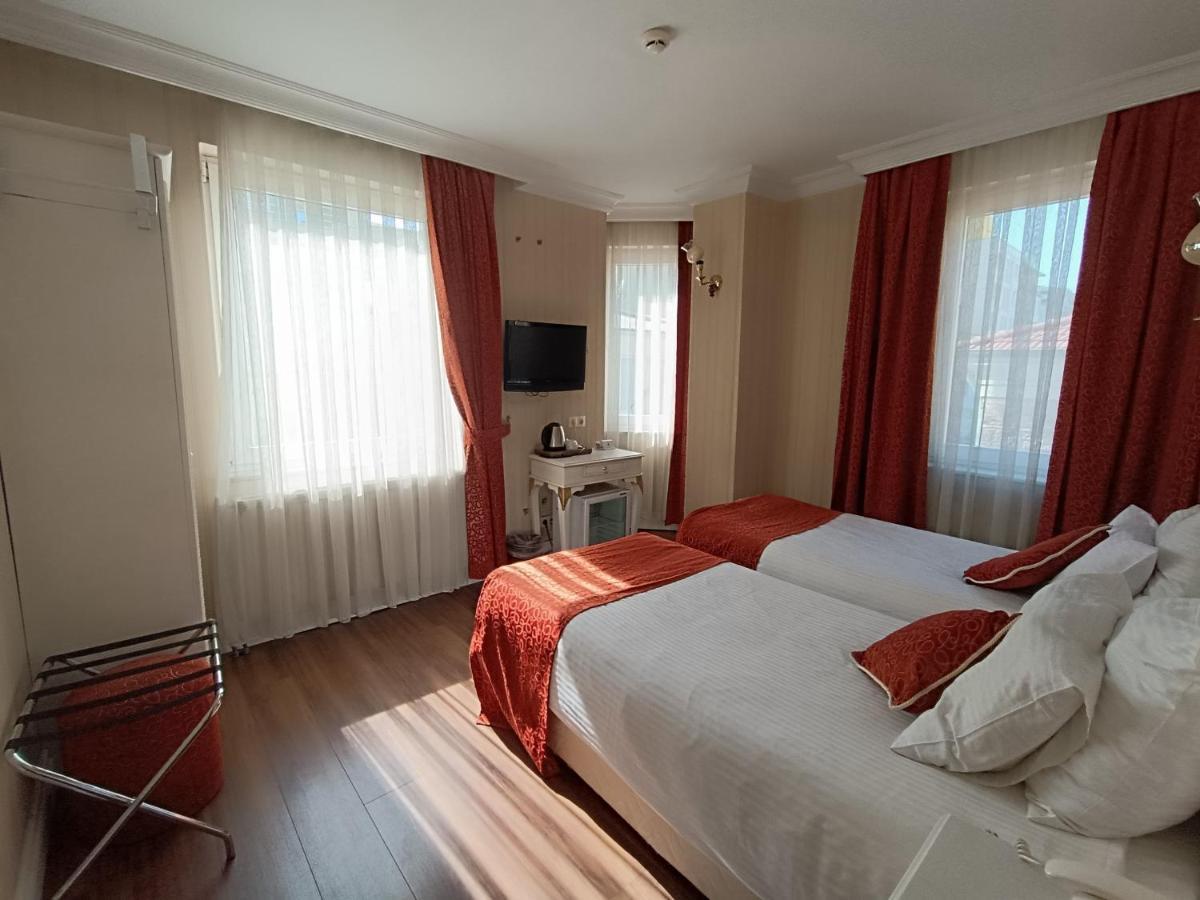 Camera Matrimoniale/Doppia con Letti Singoli con Letto Supplementare