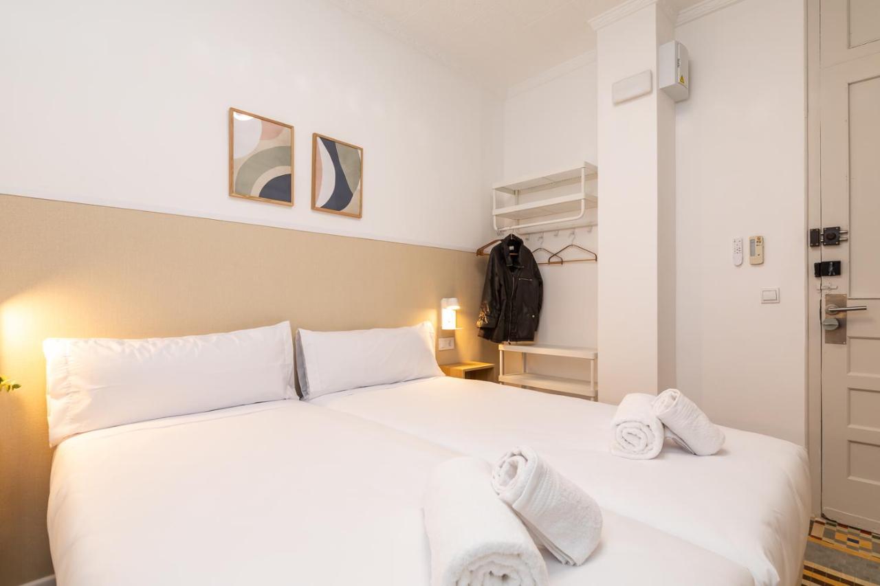 Camera Standard Doppia con Letti Singoli con Bagno in Comune