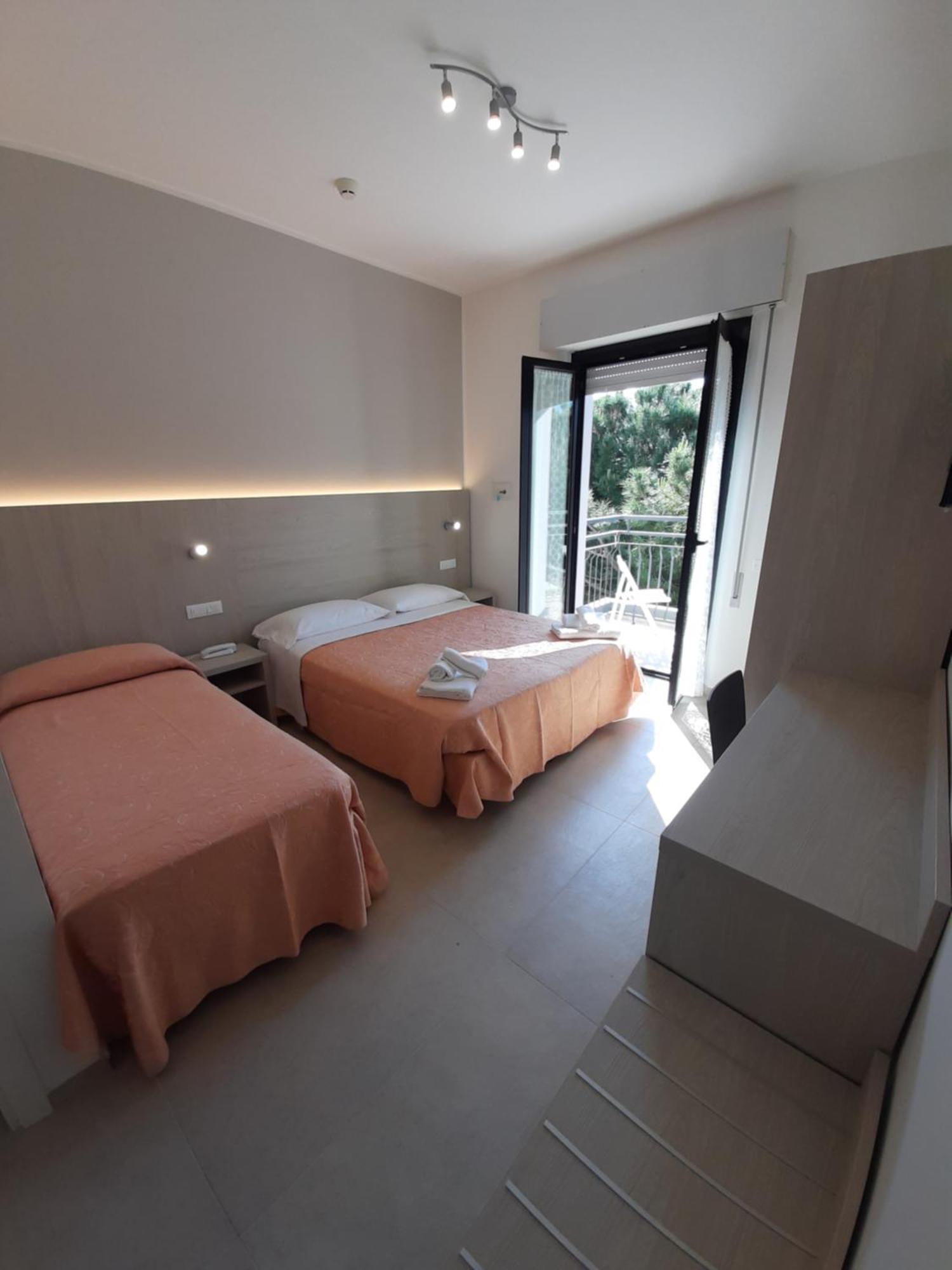 Camera Tripla Superior con Balcone