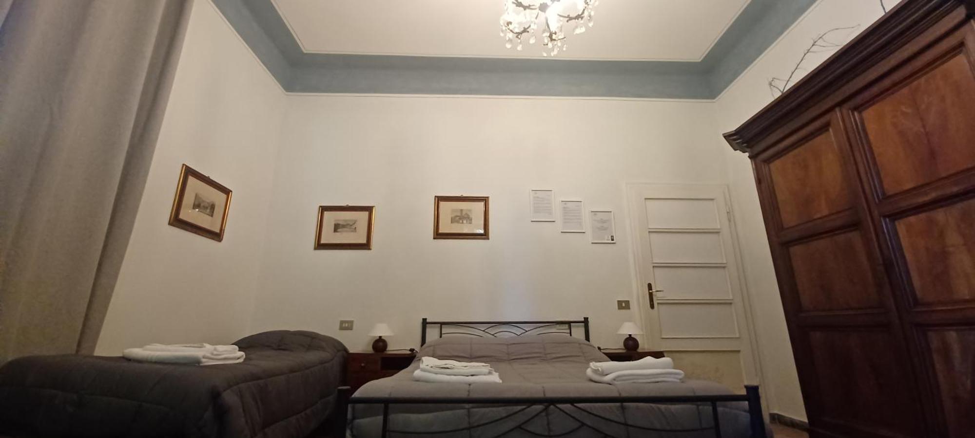 Camera Quadrupla con Bagno in Comune