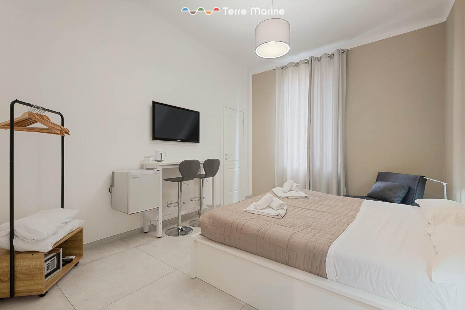 Camera Matrimoniale Deluxe con 1 Letto Supplementare