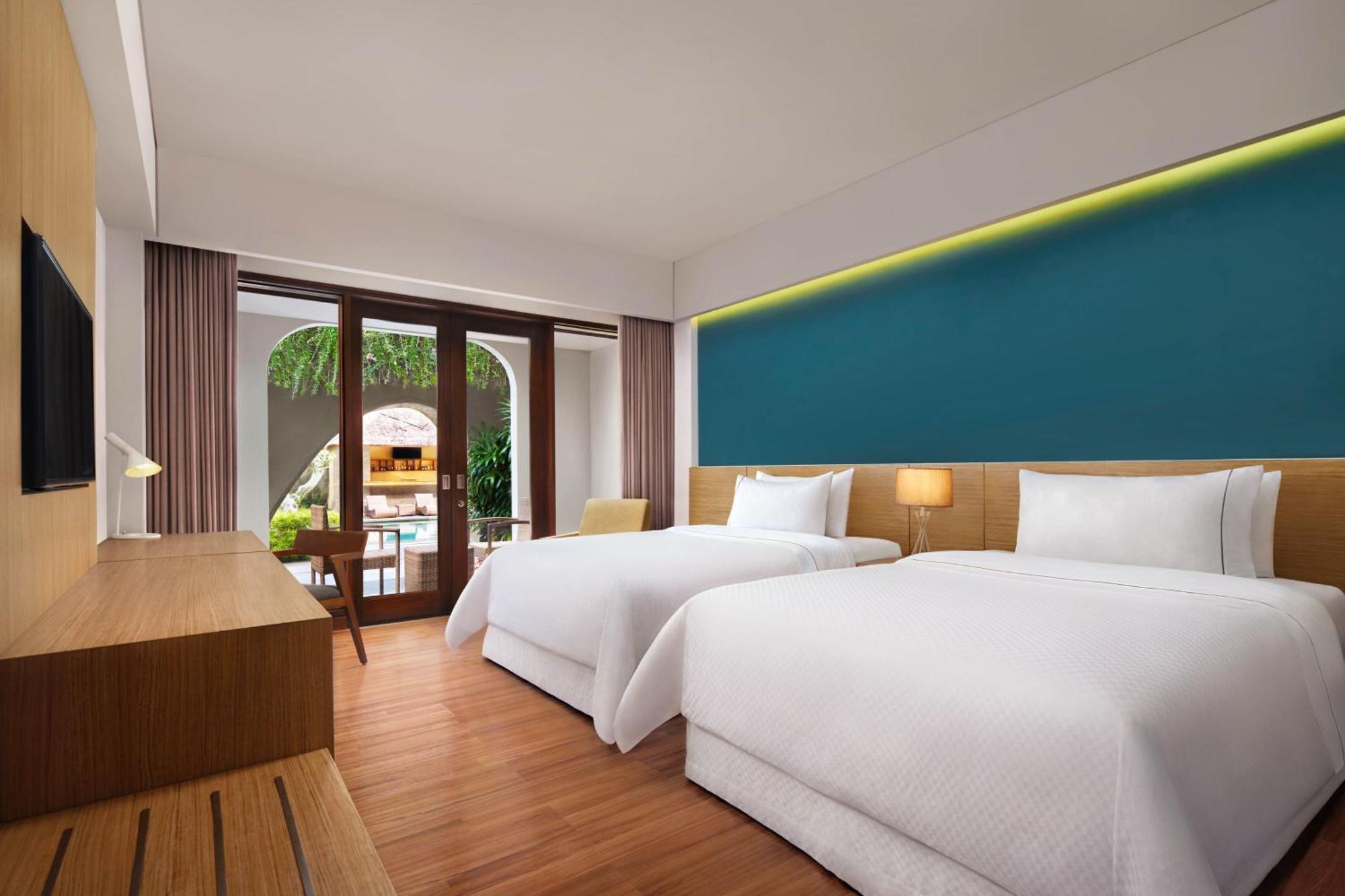 Deluxe Twin Room Pool Access Garden Level Mini Bar Daily Shuttle to Monkey Forest Daily Yoga Bike to borrow Family Activity 24 Hour access to Motion Fitness Center