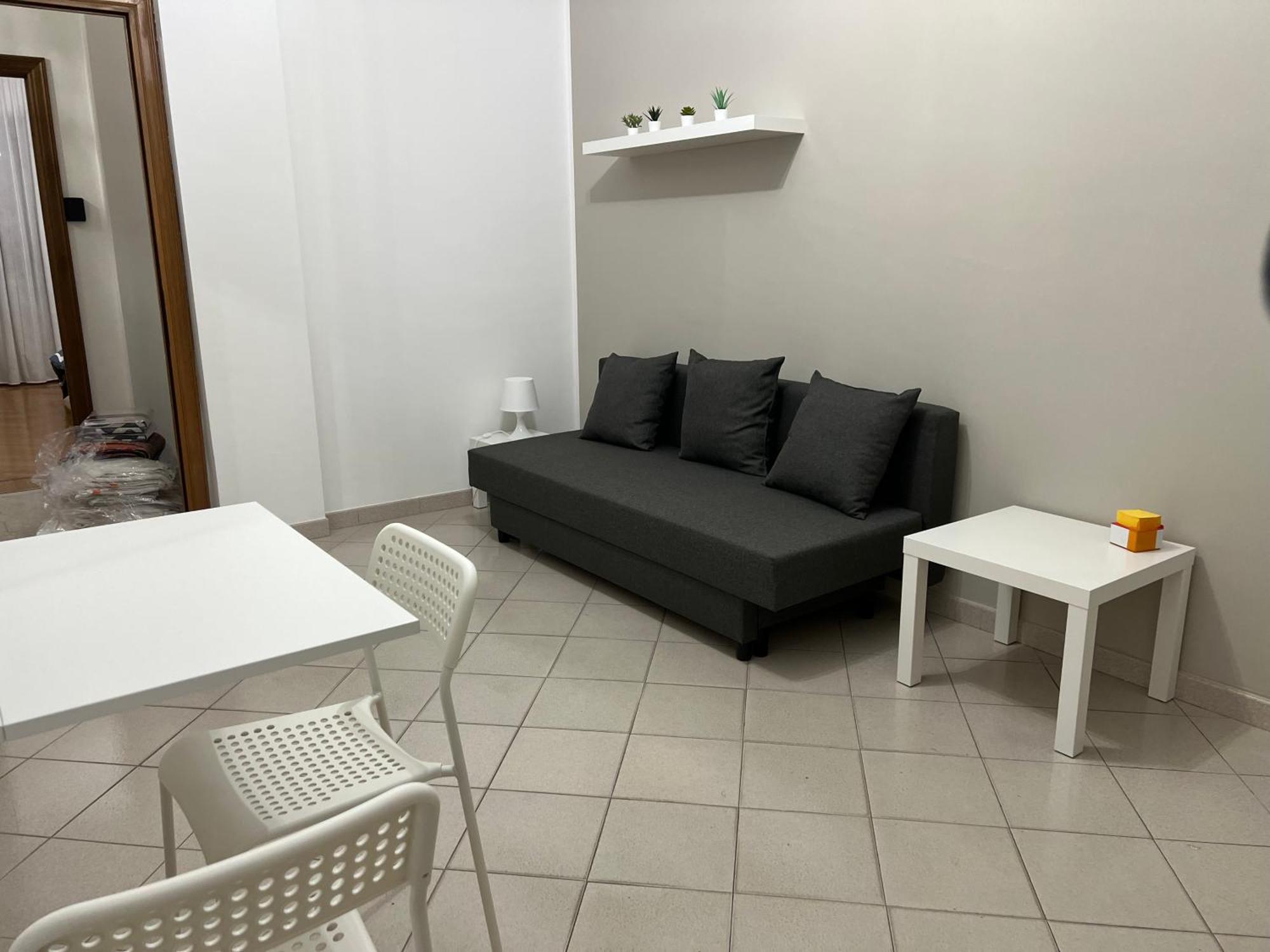 Camera Familiare con Bagno in Comune