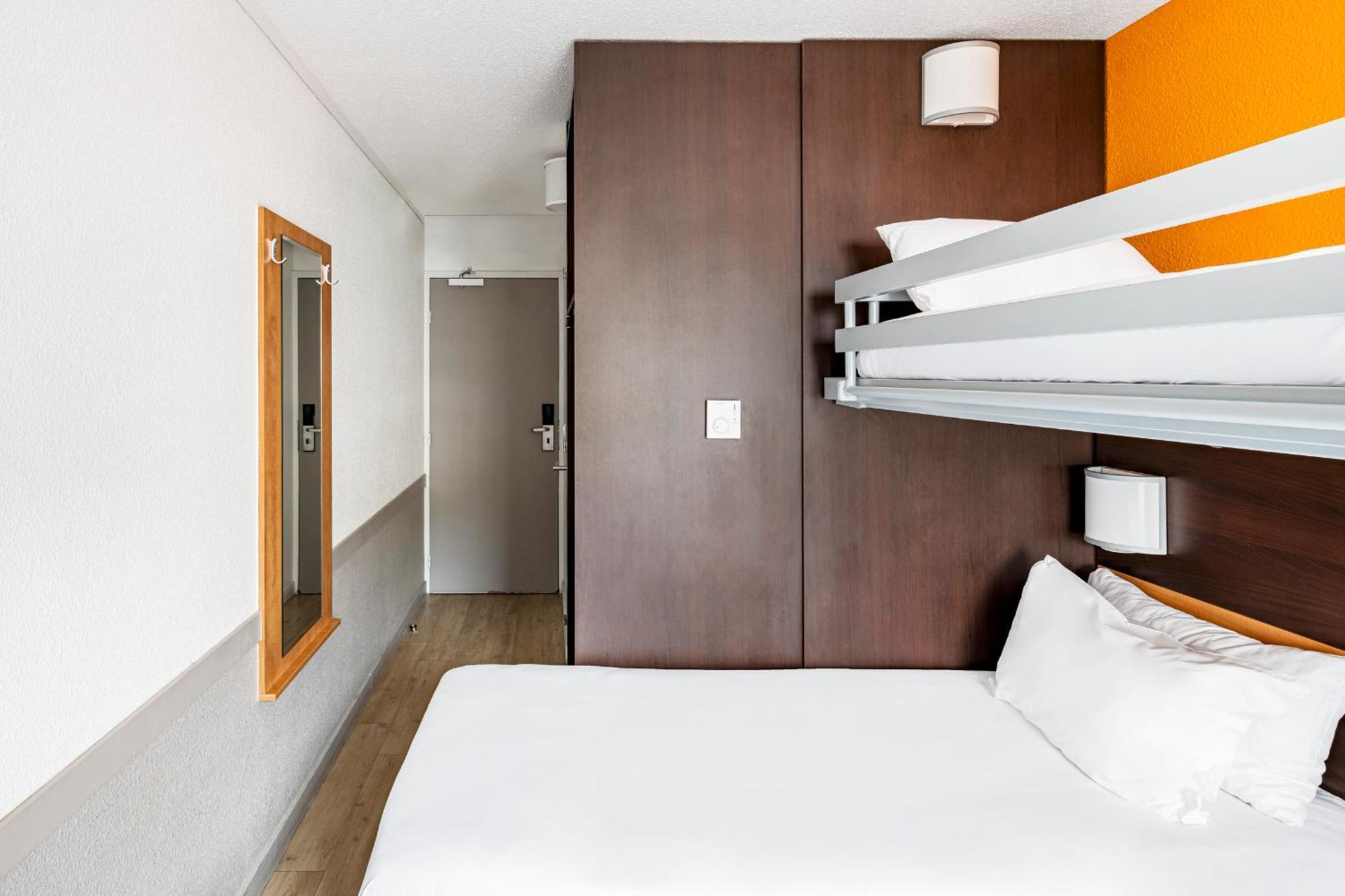 2 side-by-side Triple Rooms