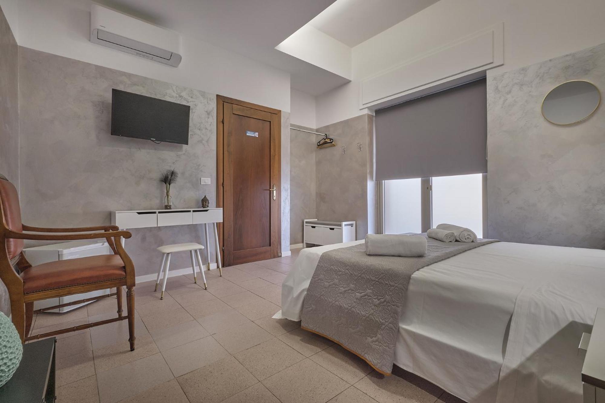Camera Matrimoniale/Doppia con Letti Singoli con Bagno Privato