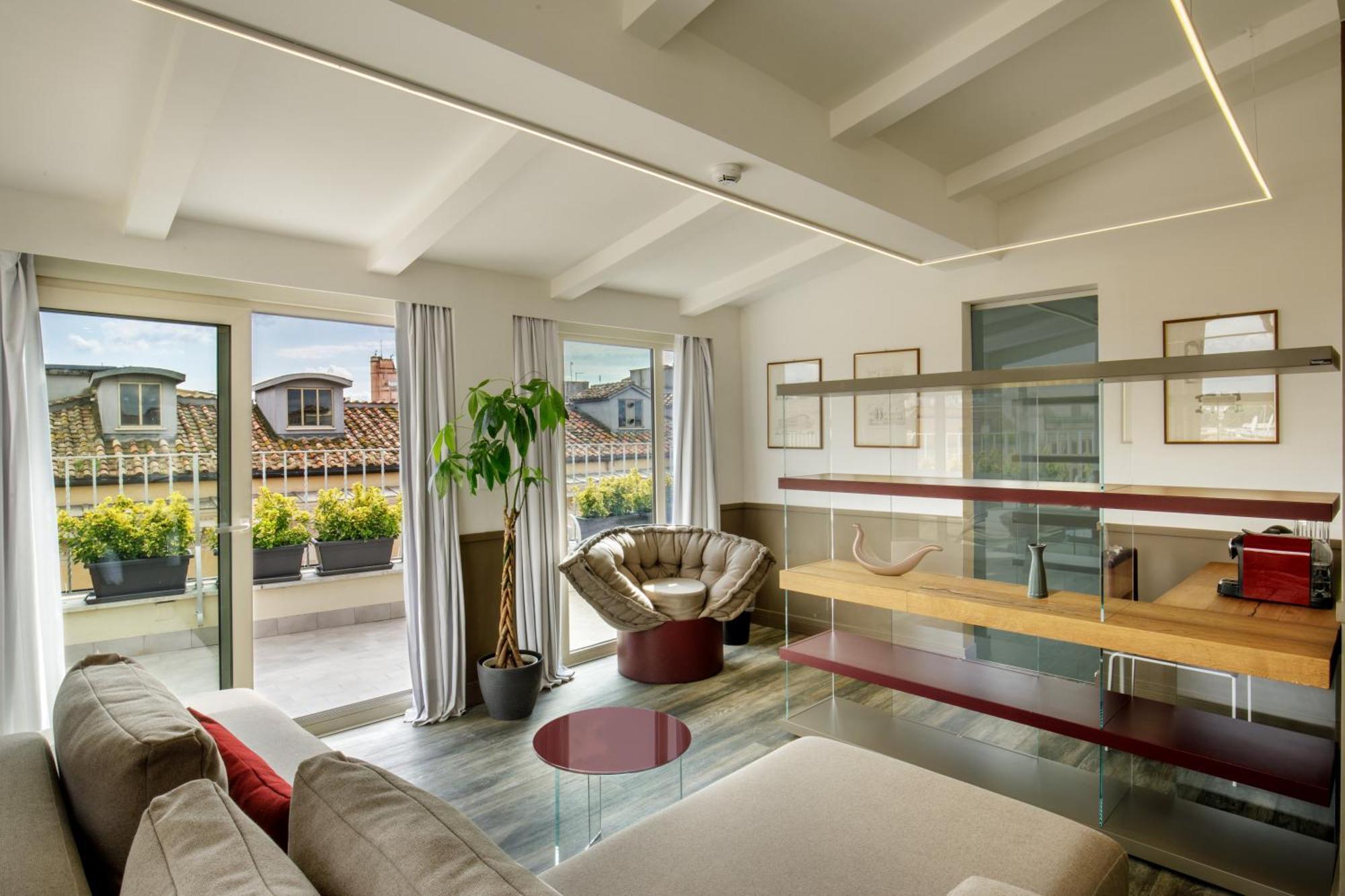 Suite a Pianta Aperta con Terrazza