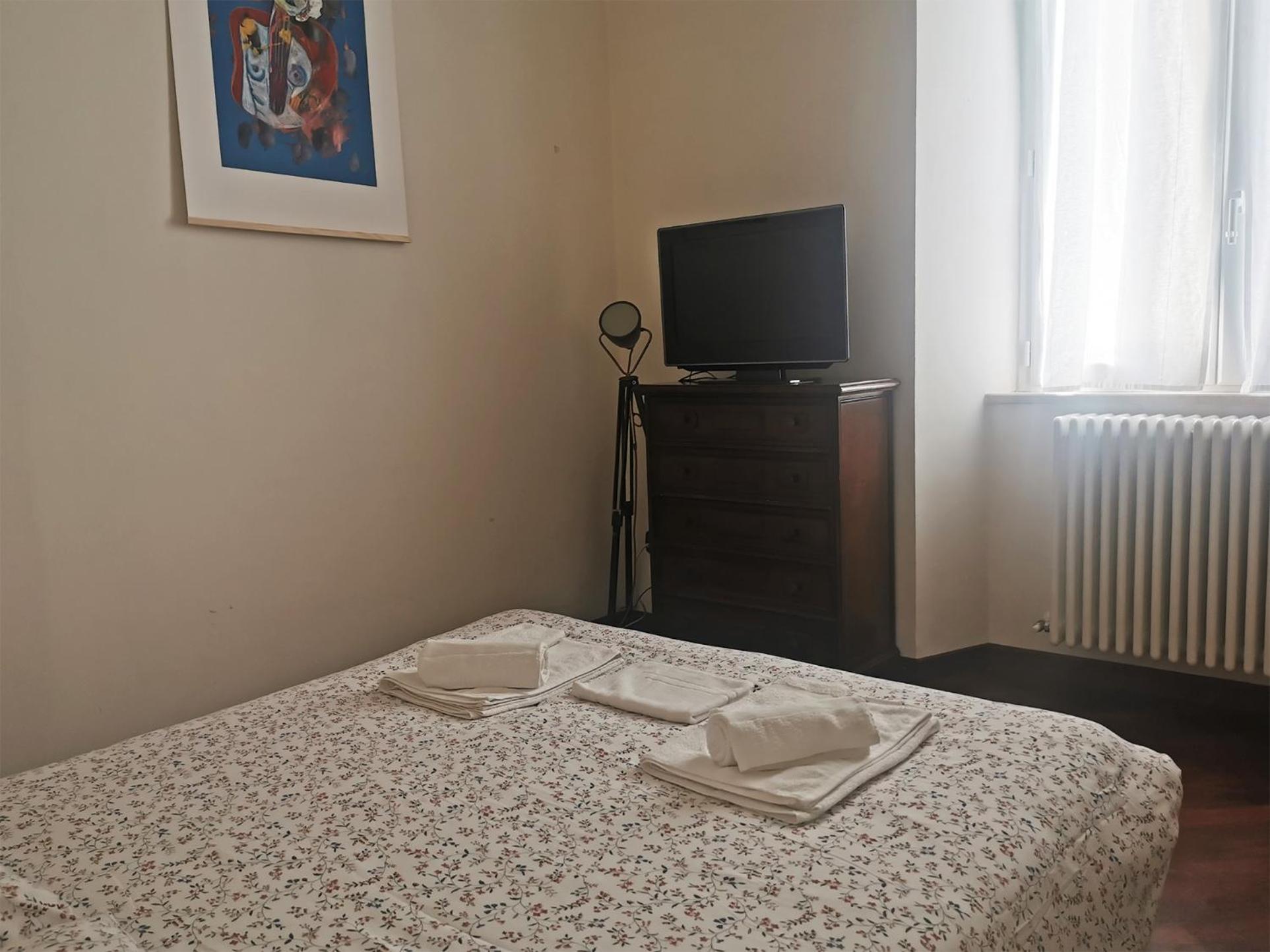 Camera Matrimoniale/Doppia con Letti Singoli con Bagno in Comune