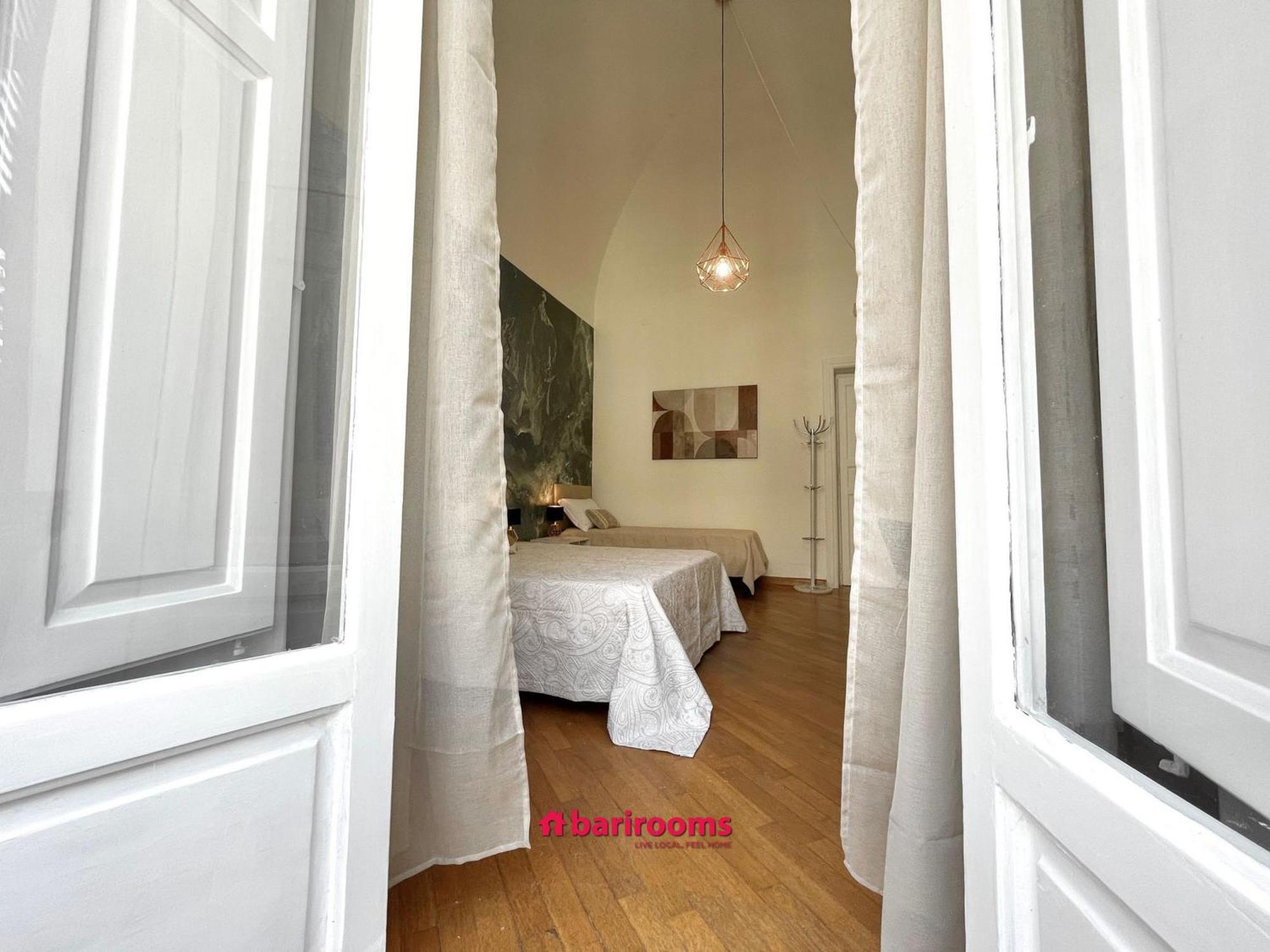 Camera Tripla con Bagno in Comune