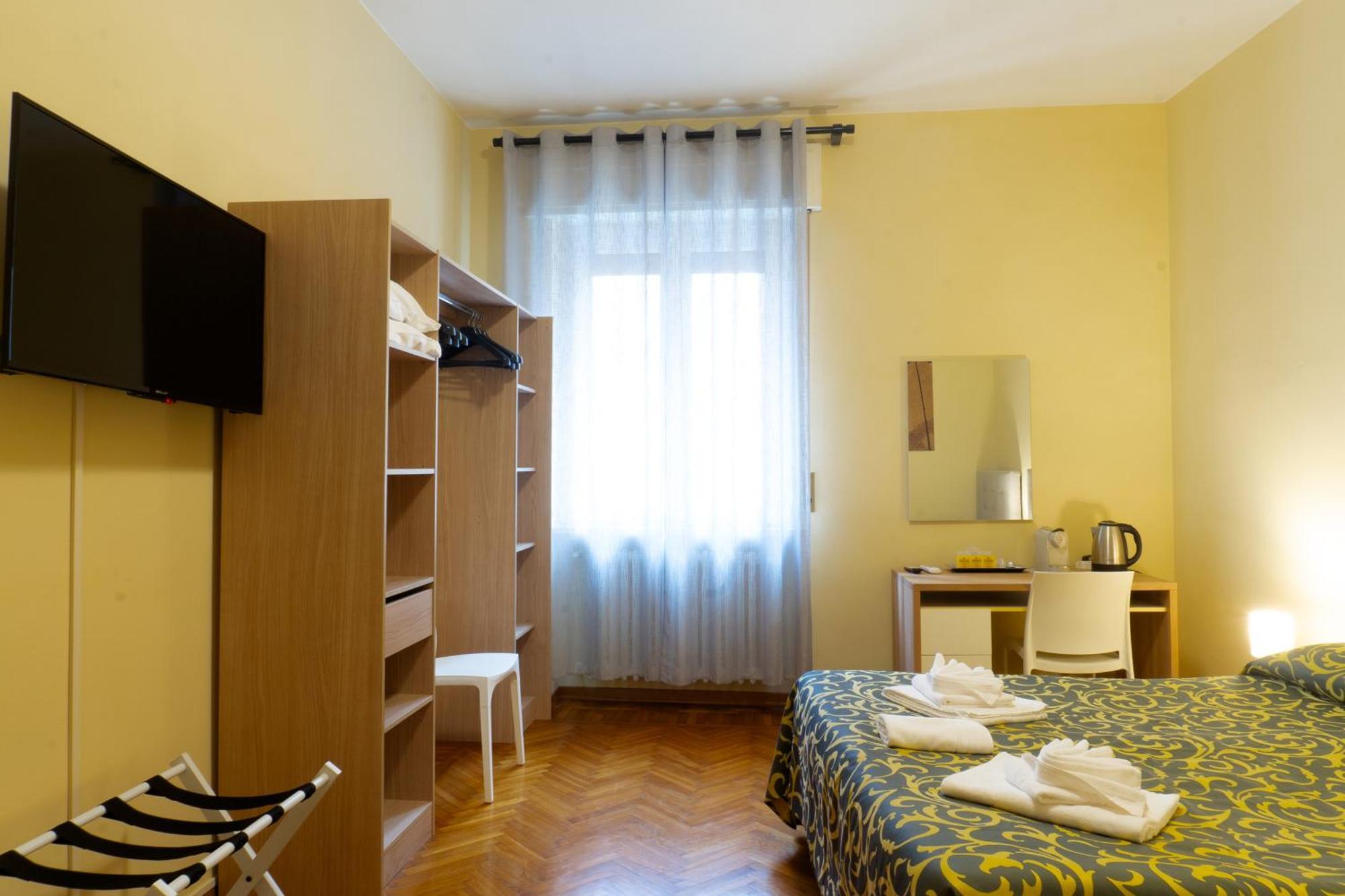 Camera Tripla con Bagno in Comune