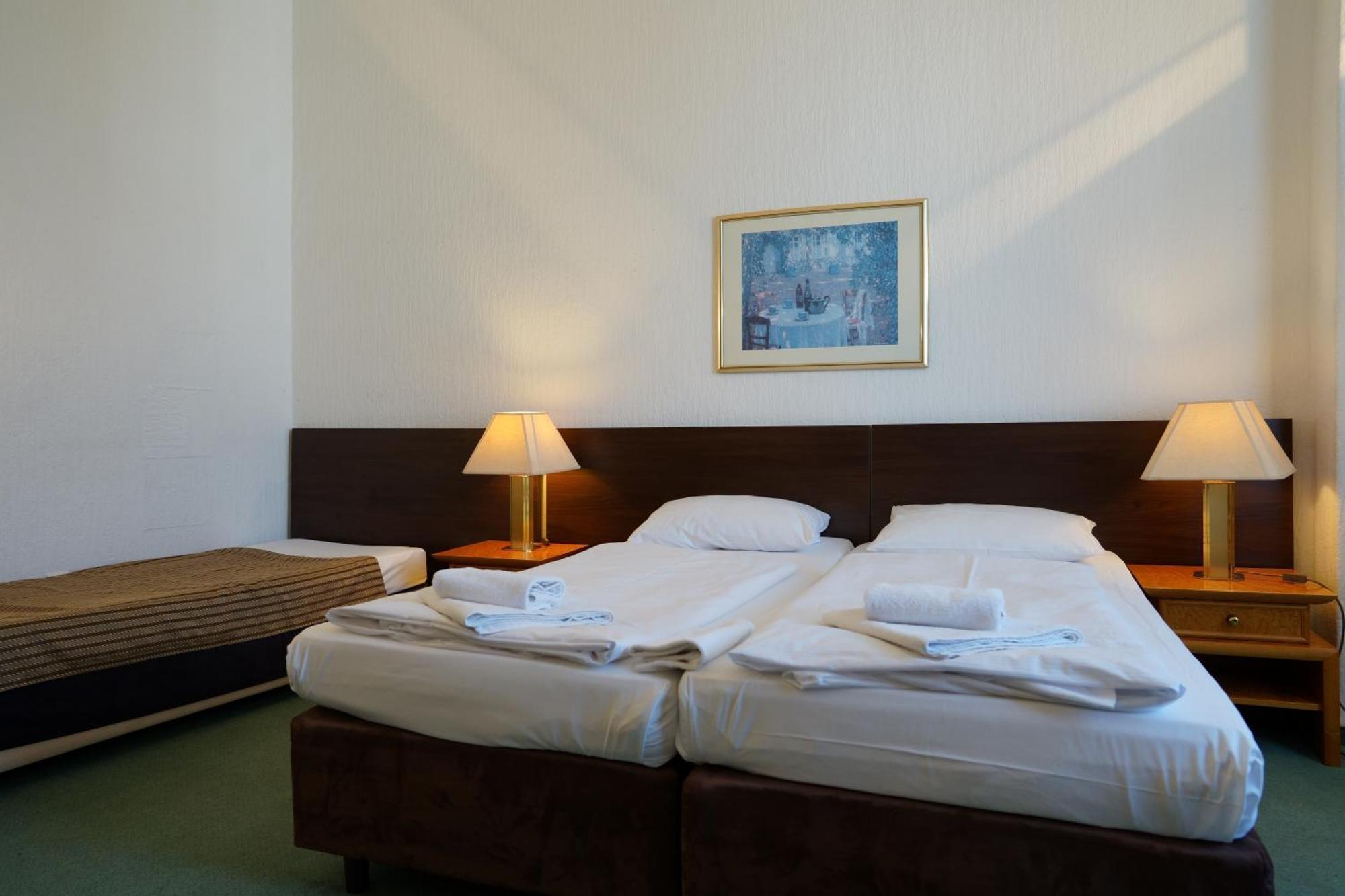 Camera Tripla con Bagno in Comune