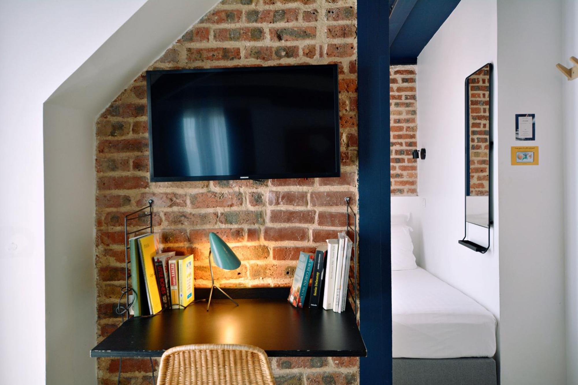 Camera Tripla Superior