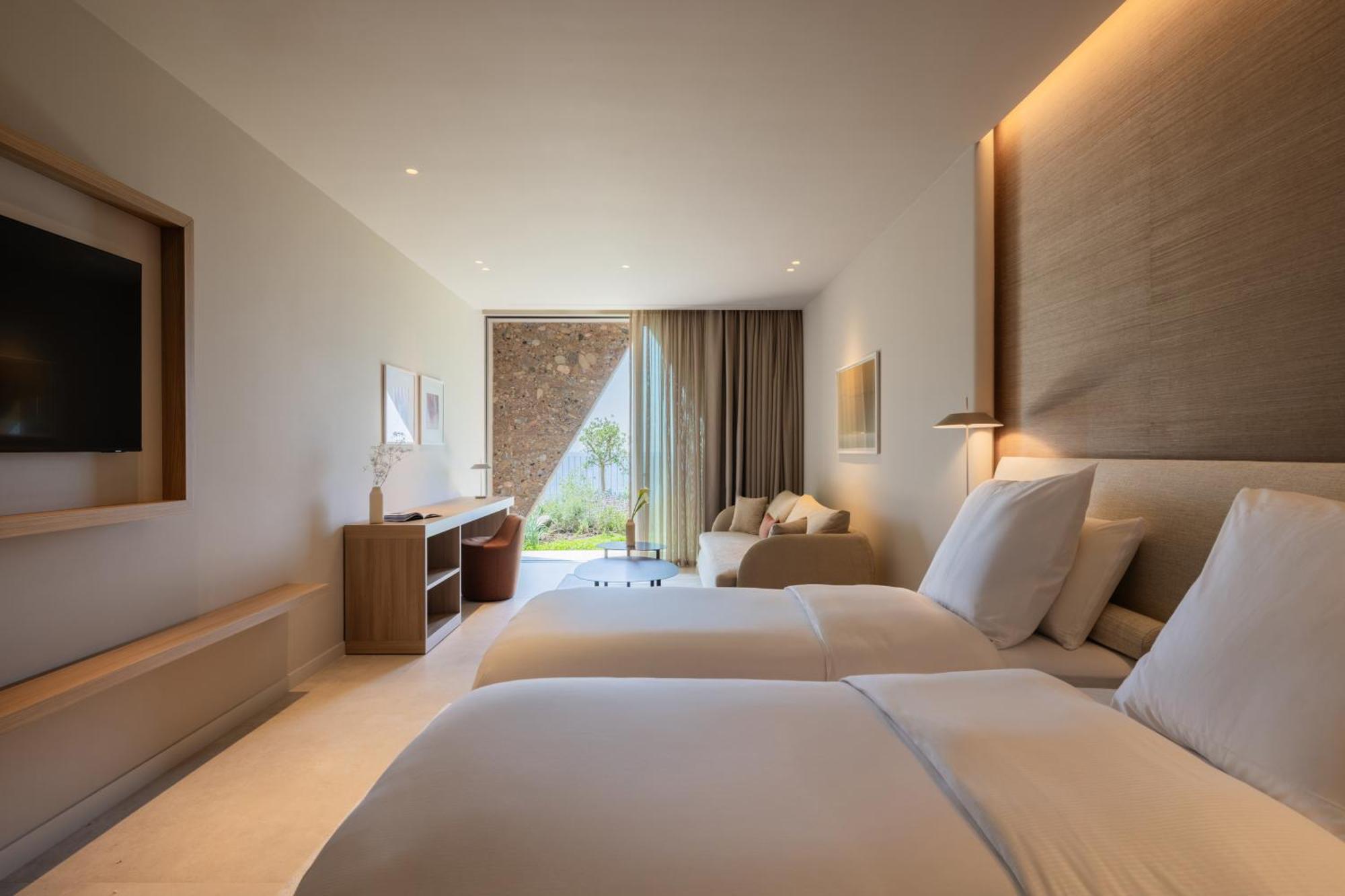 Deluxe Room with Two Twin Beds and One Sofa Bed