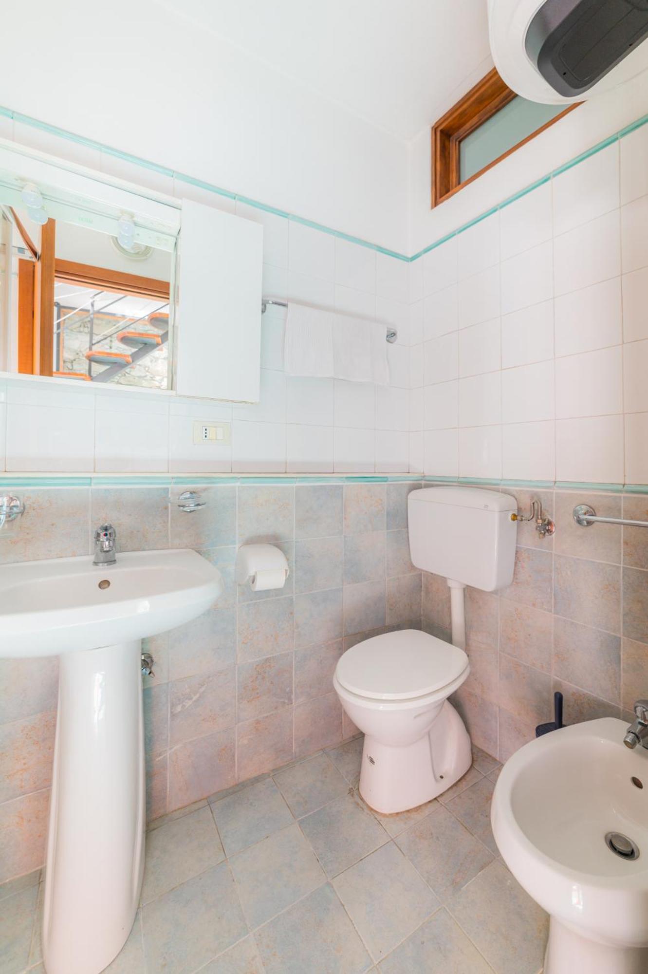 Appartamento su 2 Livelli con Balcone