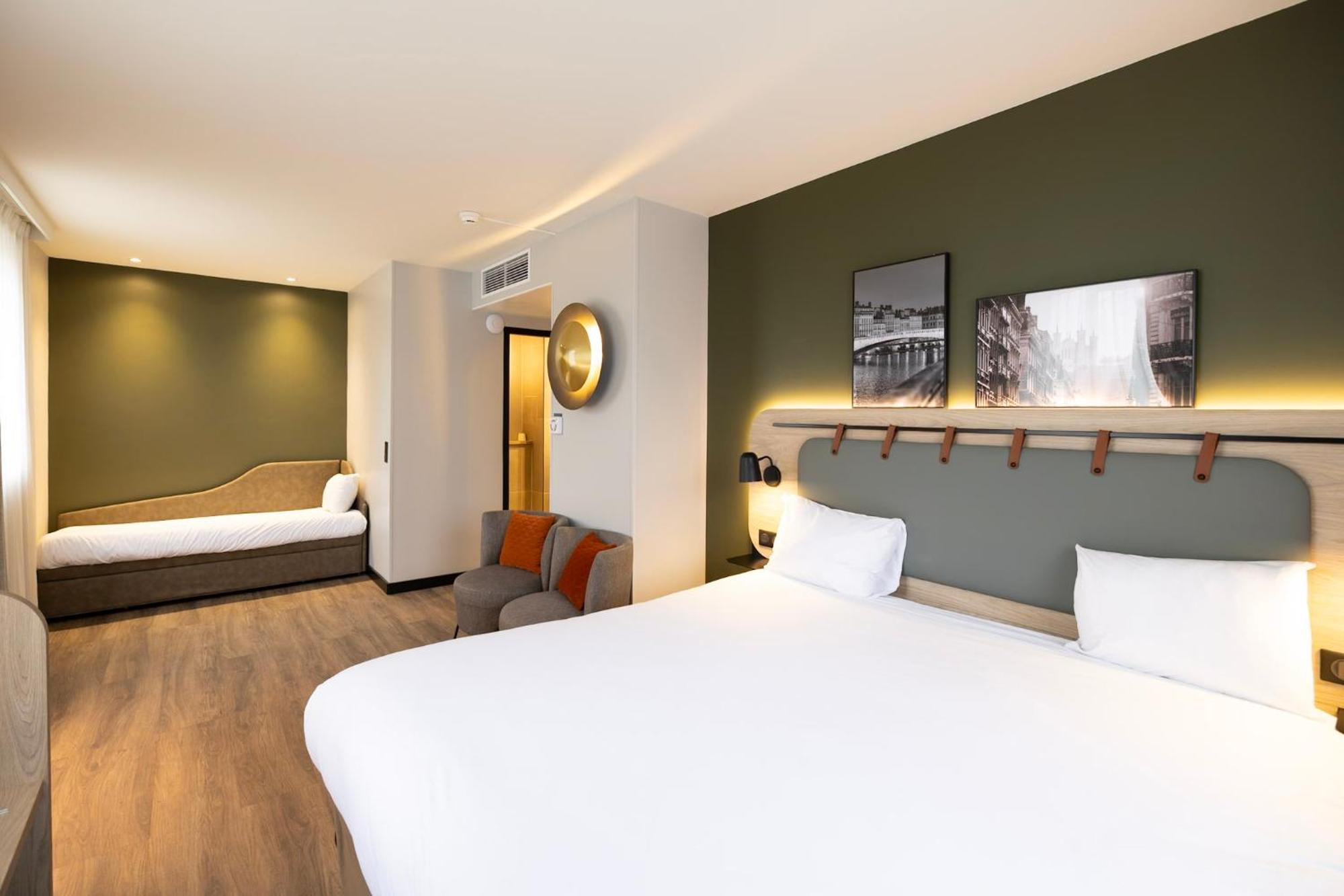Quadruple Room One Double Bed Two Single Beds or Sofa Bed
