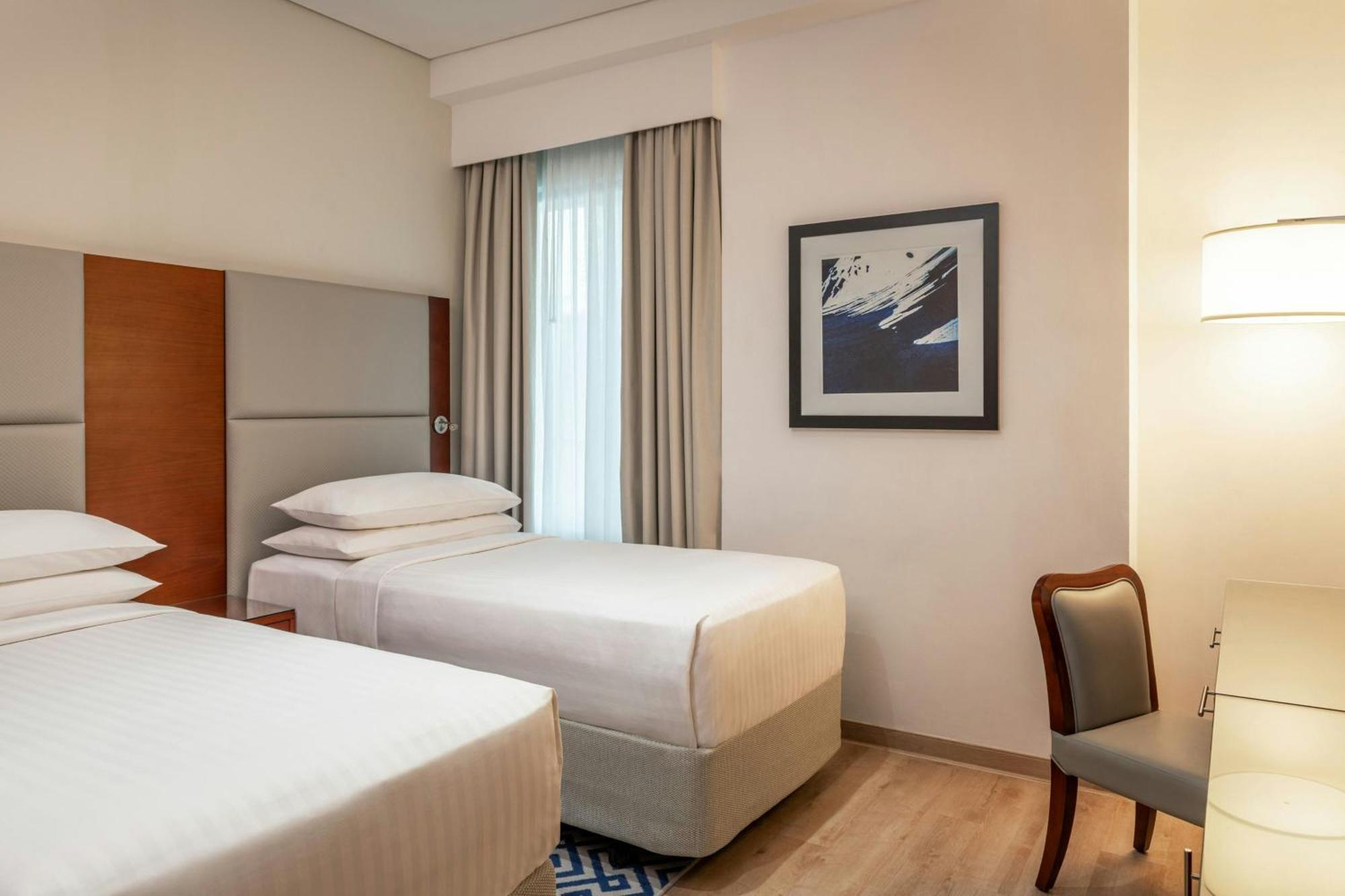 Suite con 3 Camere da Letto e Vista Mare Parziale