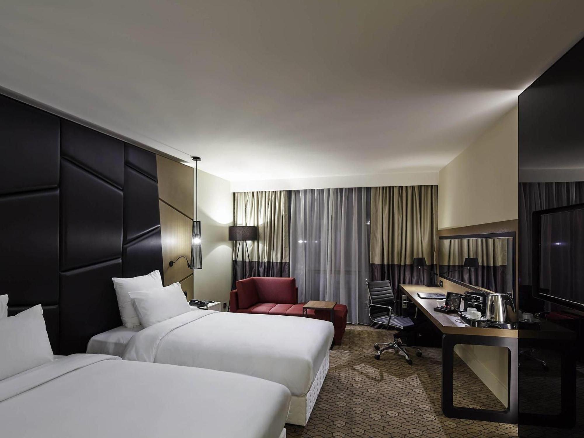 Camera Executive Doppia con Letti Singoli e Accesso Lounge