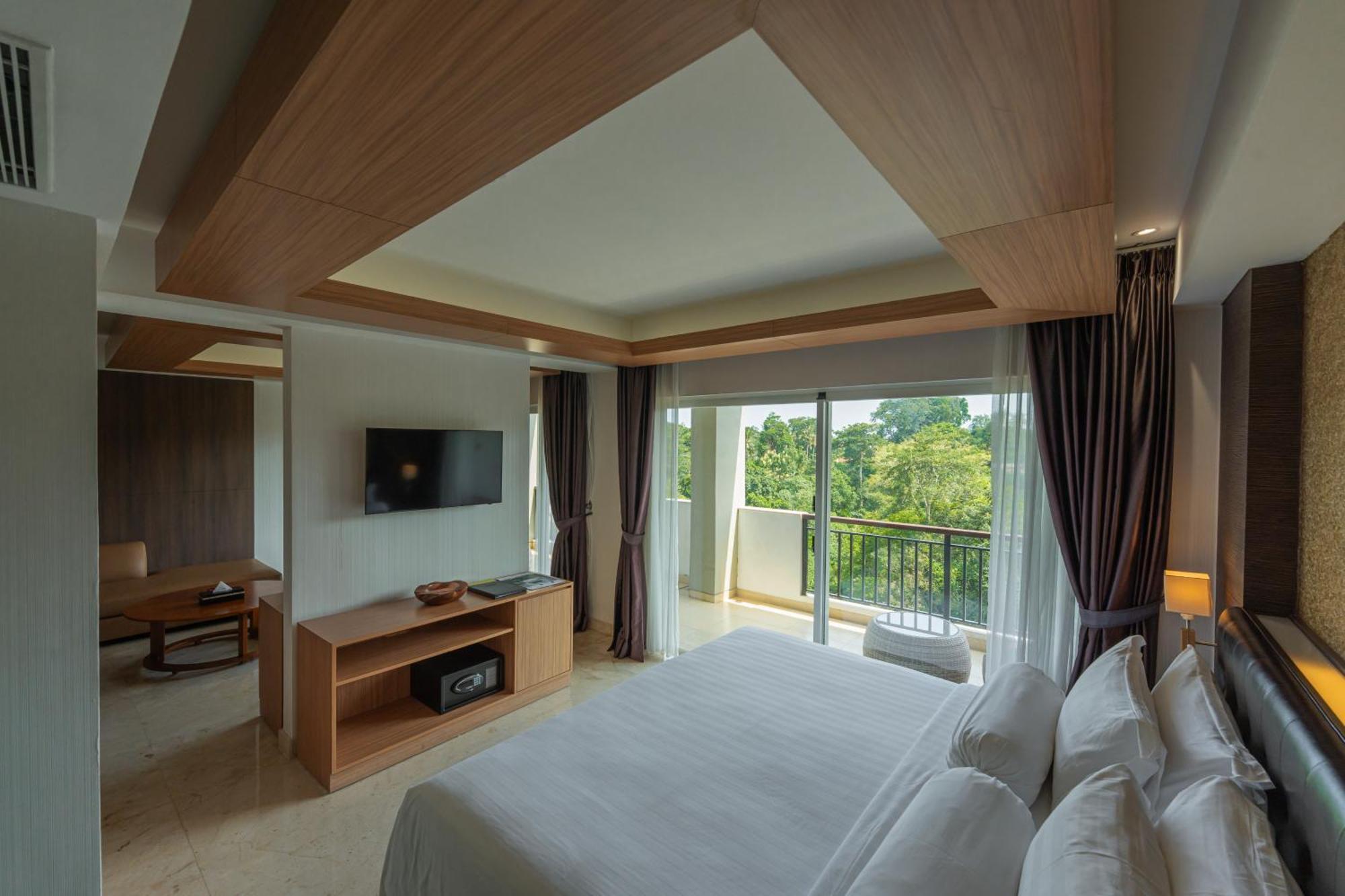 Jungle Suite Room Balcony River View daily shuttle to Ubud City Photo Session Art Gallery Visit 24-hour access to Fitness Center Welcome Drink Kids Activities