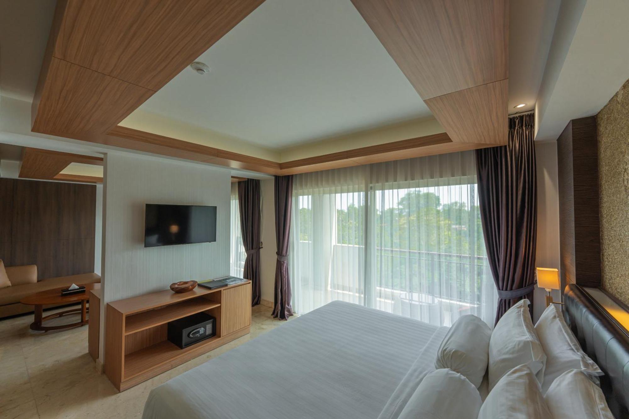Jungle Suite Room Balcony River View daily shuttle to Ubud City Photo Session Art Gallery Visit 24-hour access to Fitness Center Welcome Drink Kids Activities
