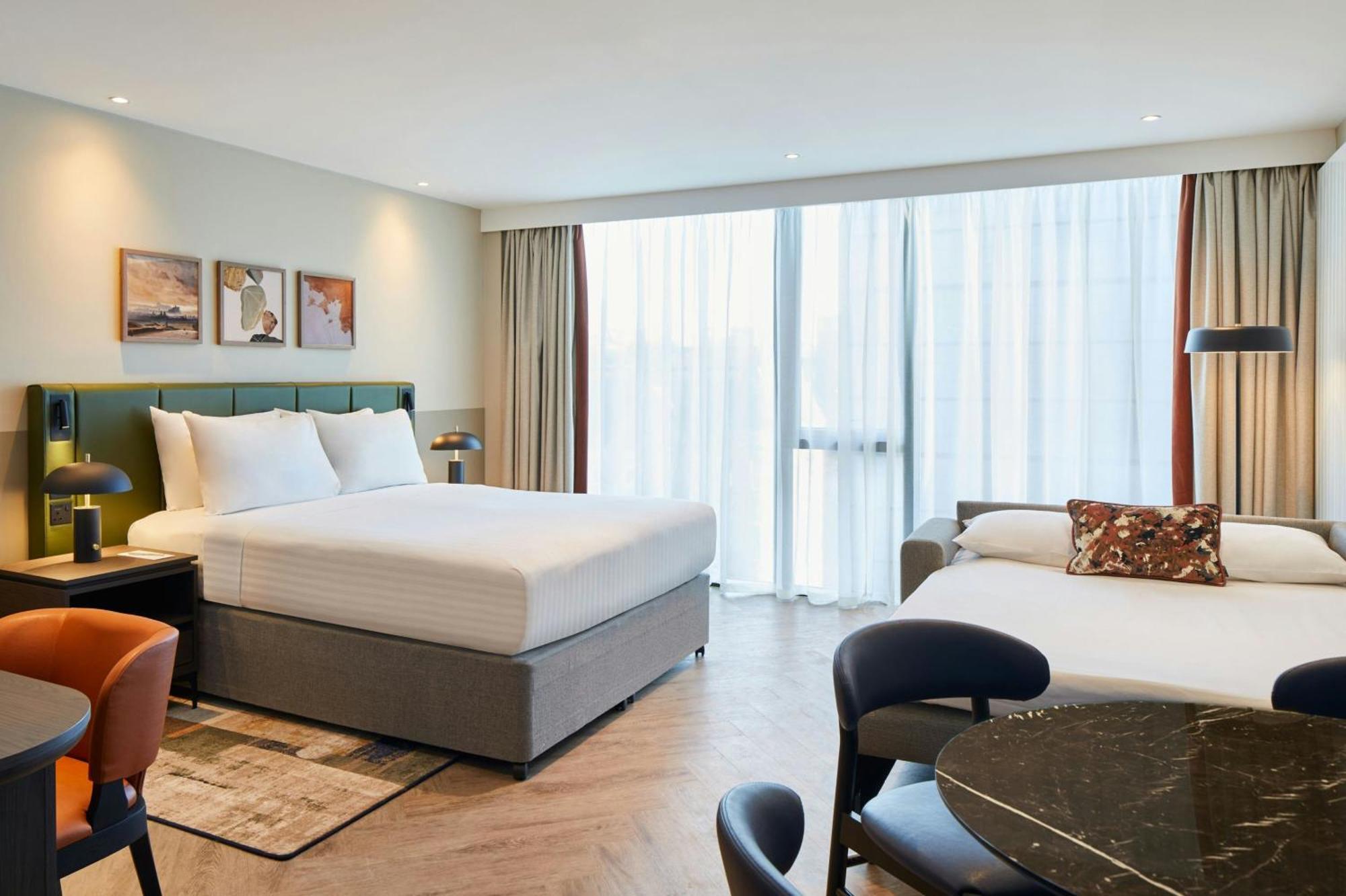 Monolocale Queen Grande con Divano-Letto