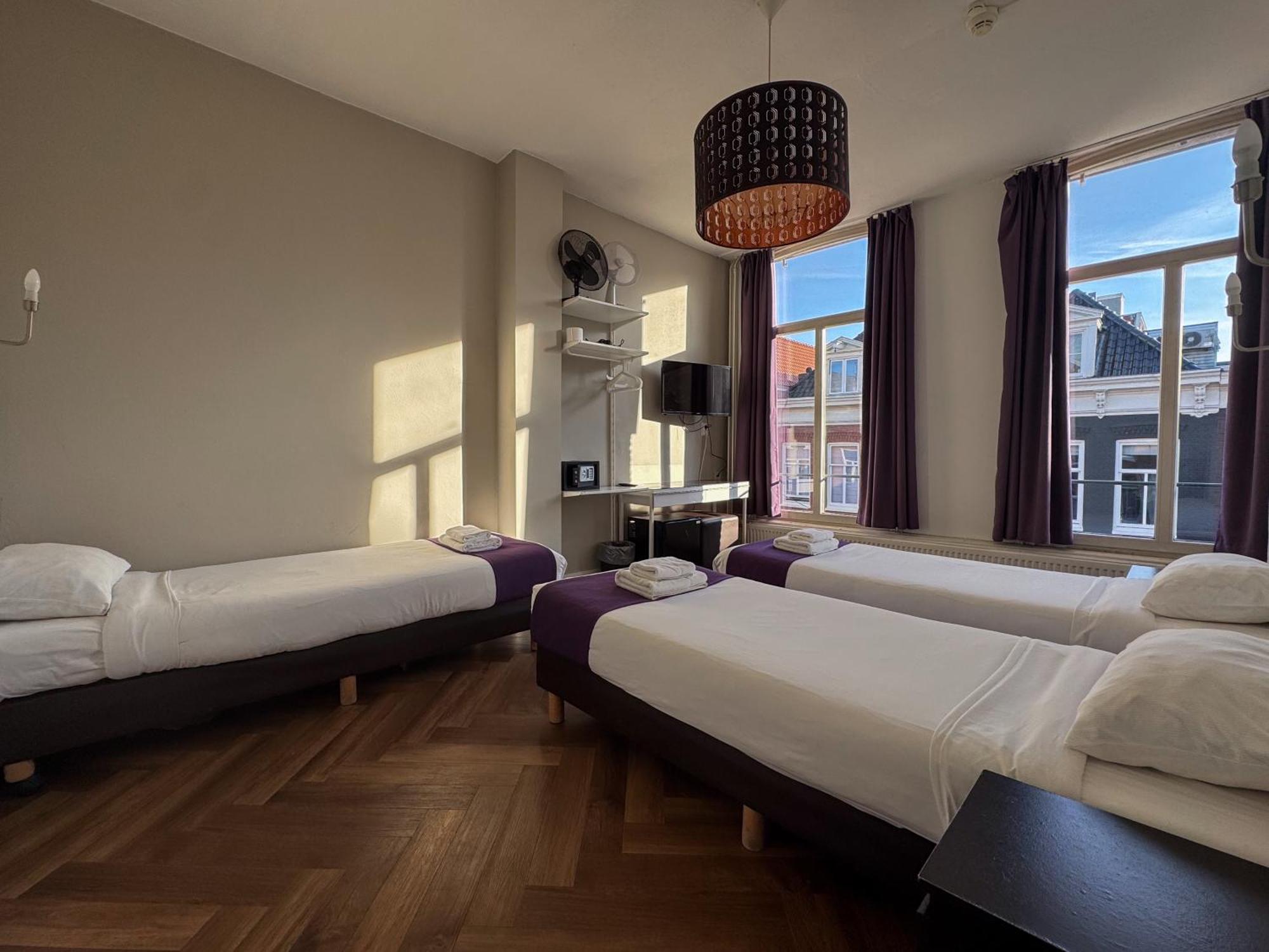 Camera Tripla Economy con Bagno in Comune