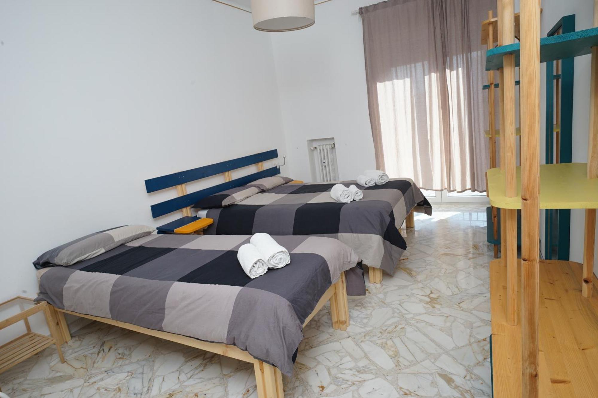 Camera Tripla Basic con Bagno in Comune