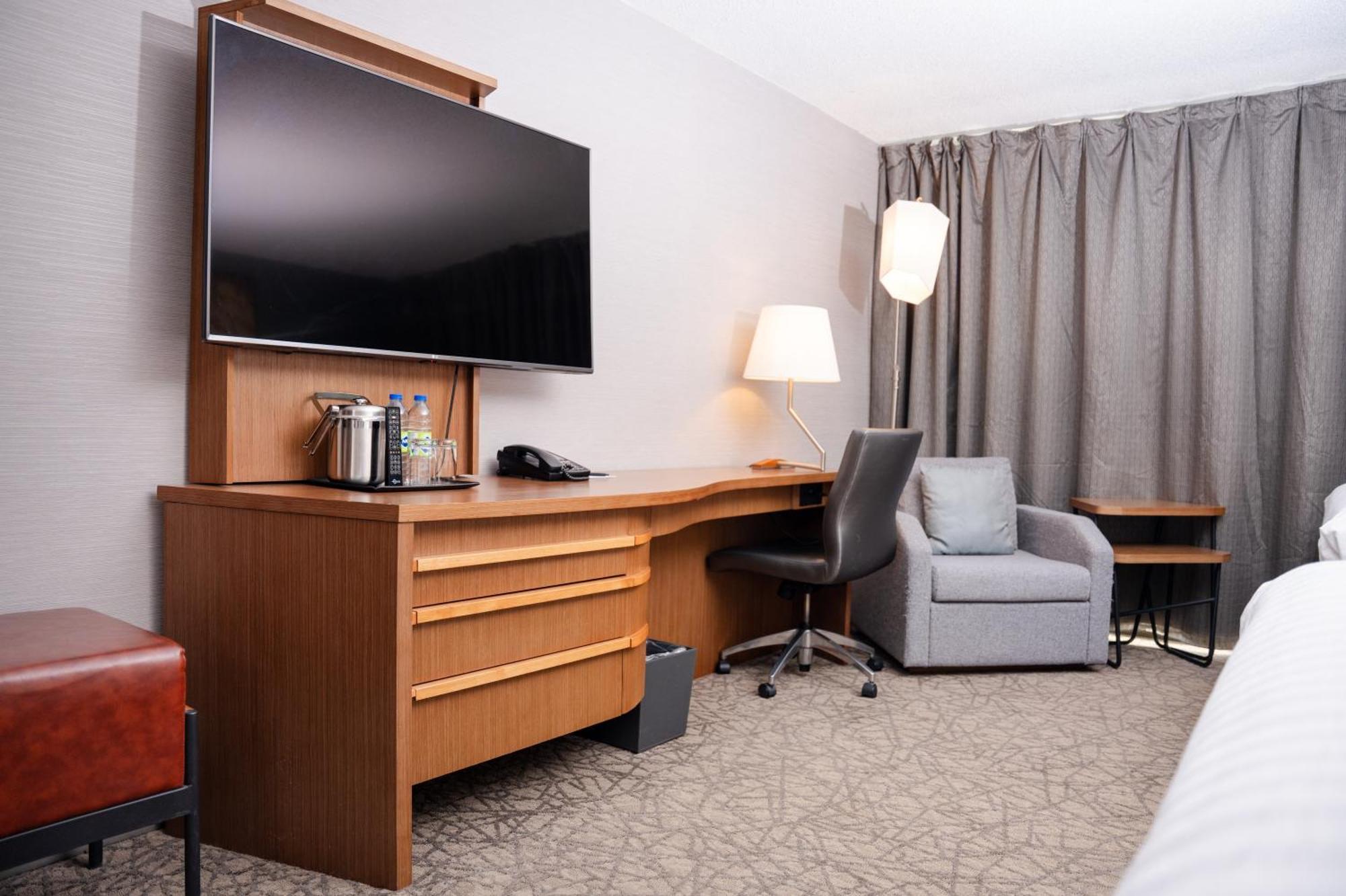 Premium Queen Room Two Queen Beds Additional Living Area Ravine View
