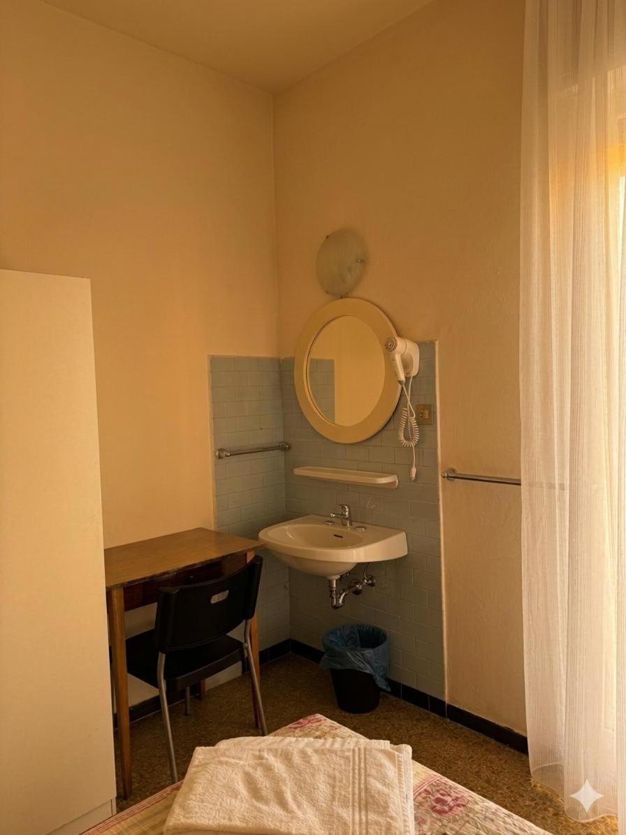 Camera Quadrupla con Bagno in Comune