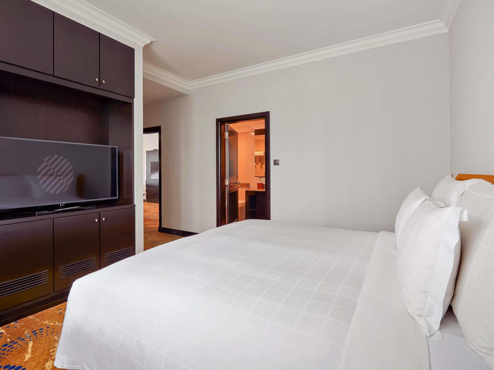 Two-Bedroom Apartment One King Bed Two Single Beds