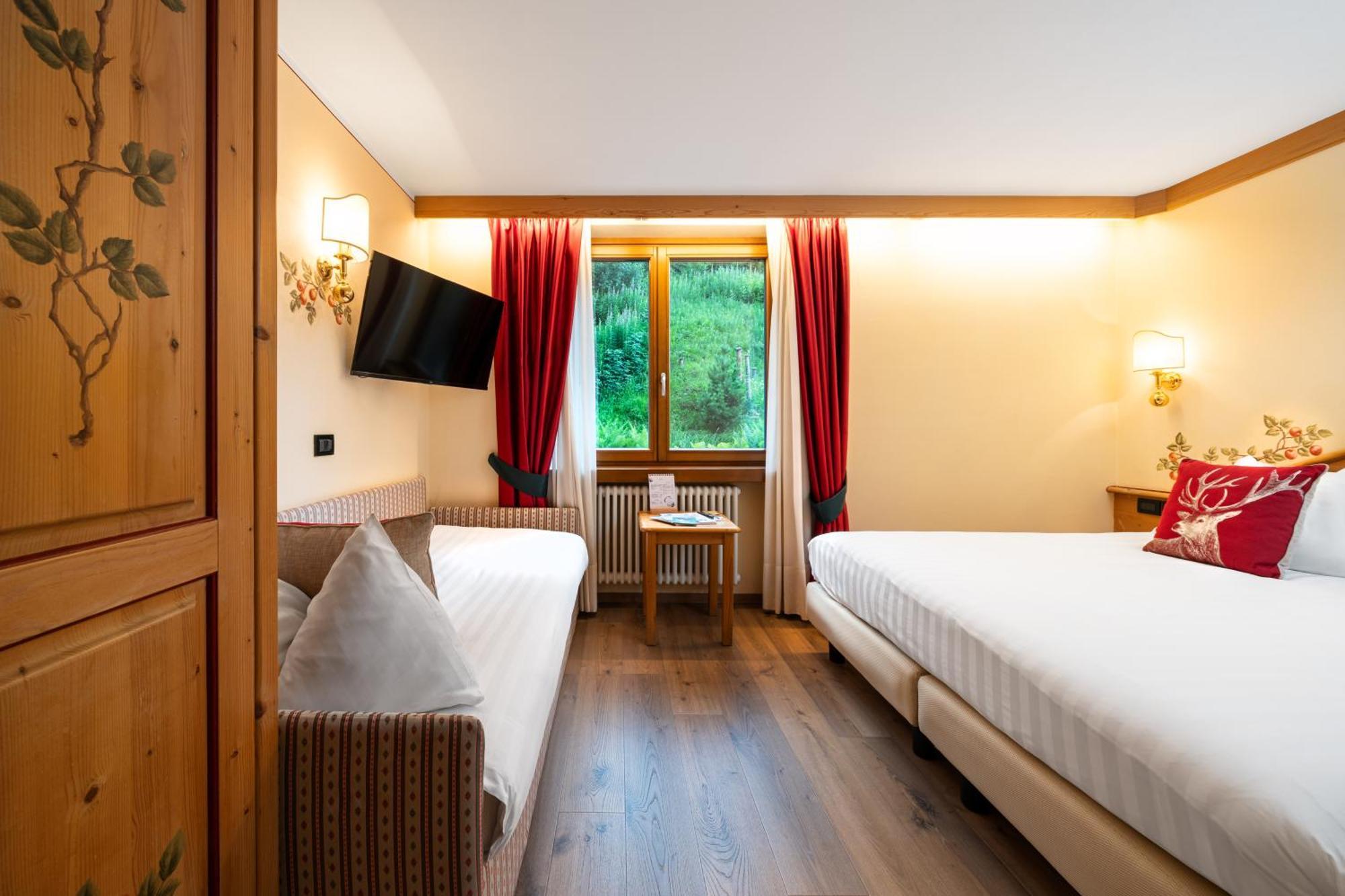 Camera Matrimoniale con Letto Supplementare
