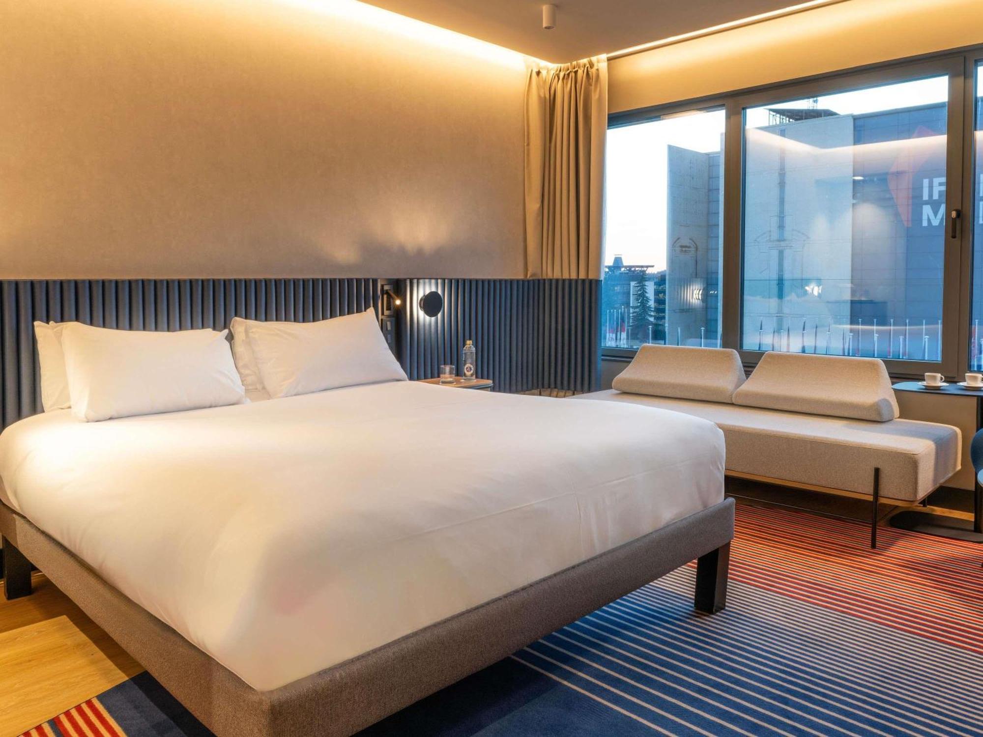 Camera Executive Queen con letto queen nell’edificio Deluxe
