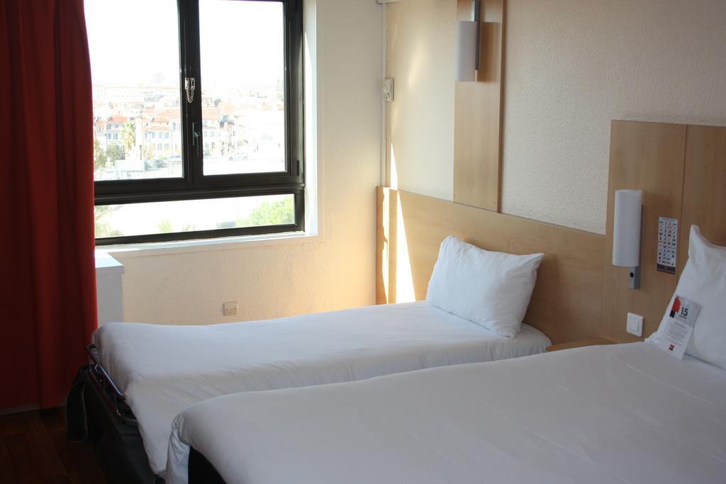 Camera Tripla Superior con Divano-Letto