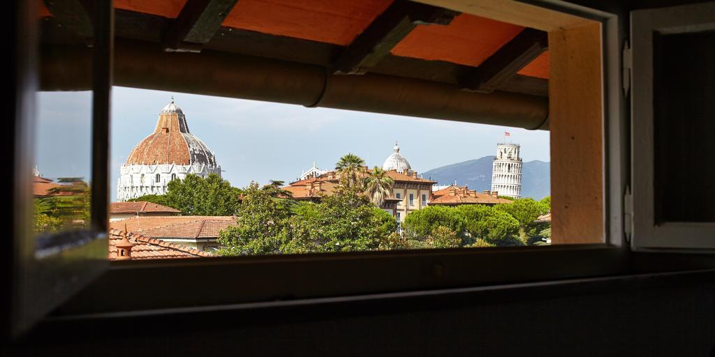 Camera Tripla Mansardata con Vista Torre