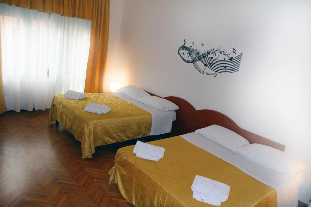 Camera Quadrupla con Bagno in Comune