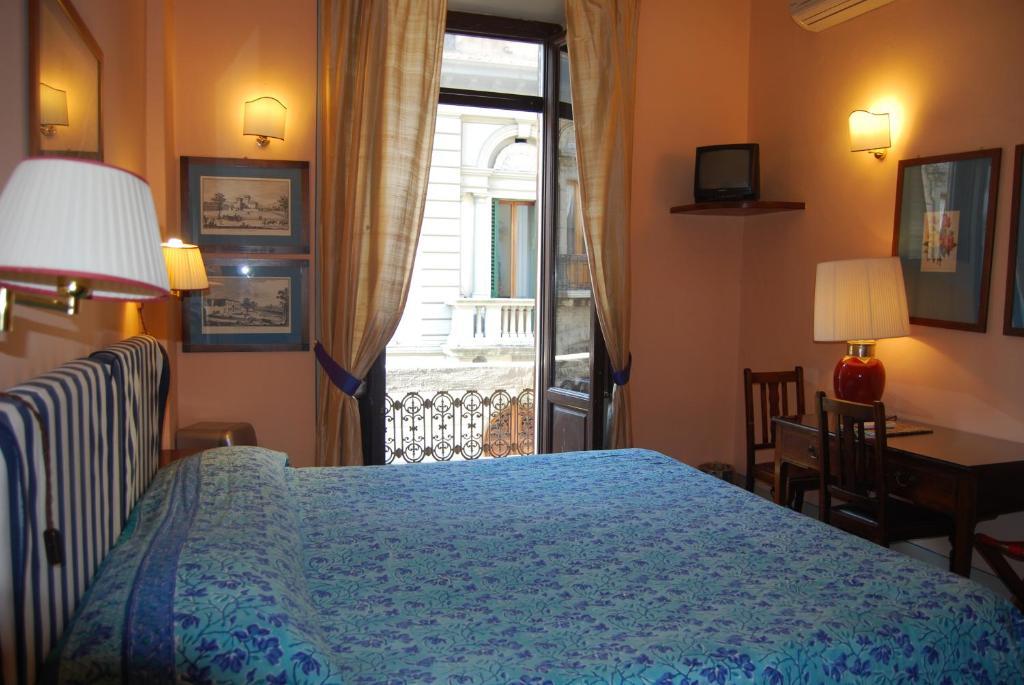 Camera Matrimoniale/Doppia con Letti Singoli con Letto Supplementare