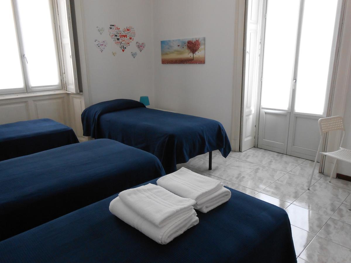 Camera Quadrupla Economy con Bagno in Comune
