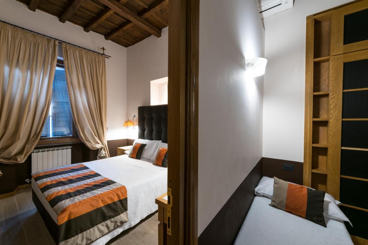 Camera Matrimoniale/Doppia con Letti Singoli con Letto Supplementare