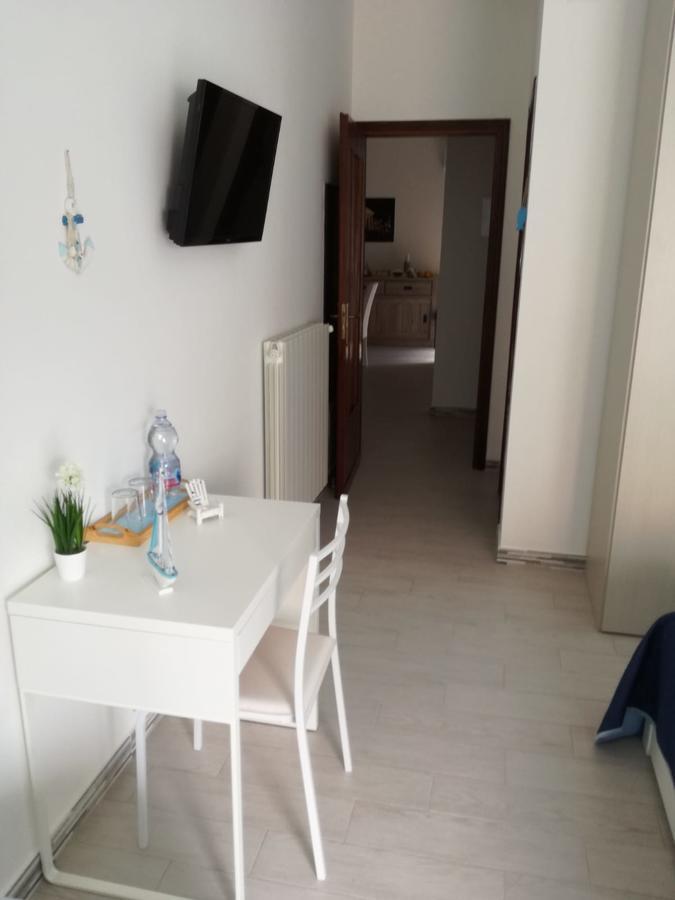 Camera Tripla con Bagno Privato e Balcone
