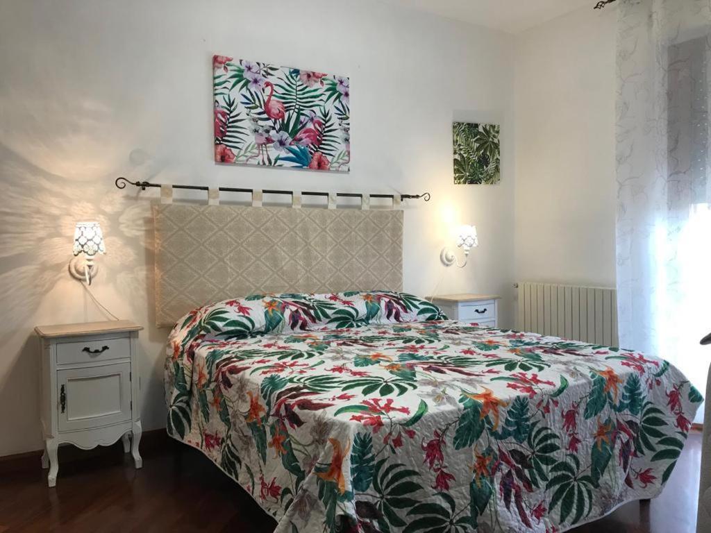 Camera Matrimoniale/Doppia con Letti Singoli con Bagno in Comune