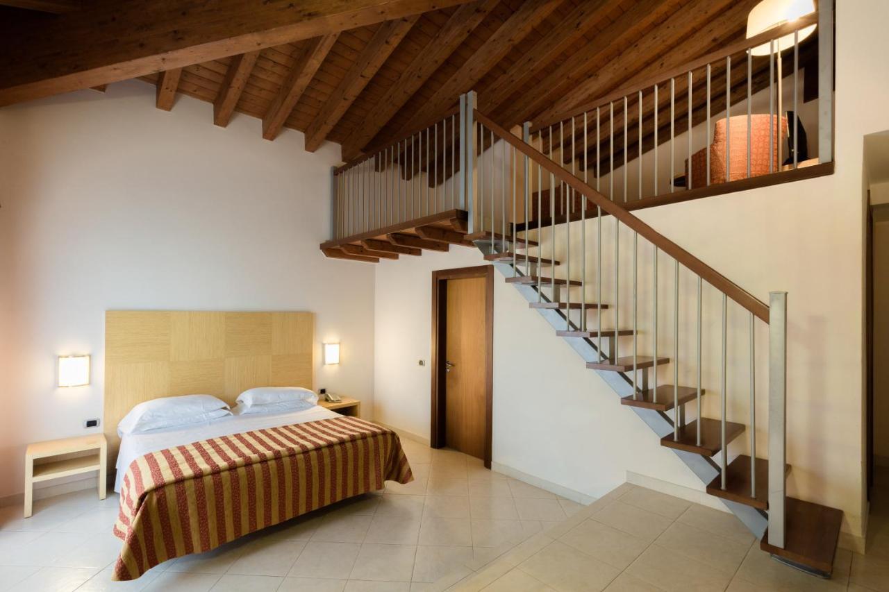 Junior Suite Familiare con Vista Giardino e Accesso Spa