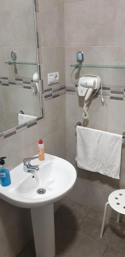 Camera Familiare con Bagno in Comune